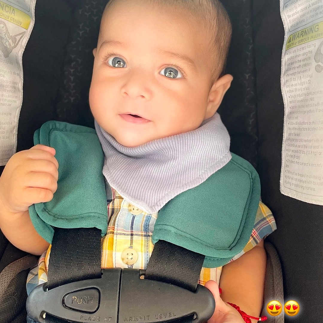 Matías is registered to the contest to win money with this photo: accessories, baby, bodypart, clothing, coat, cushion, face, finger, hand, happy, head, homedecor, jacket, pants, person, photography, portrait, smile, strap, vest