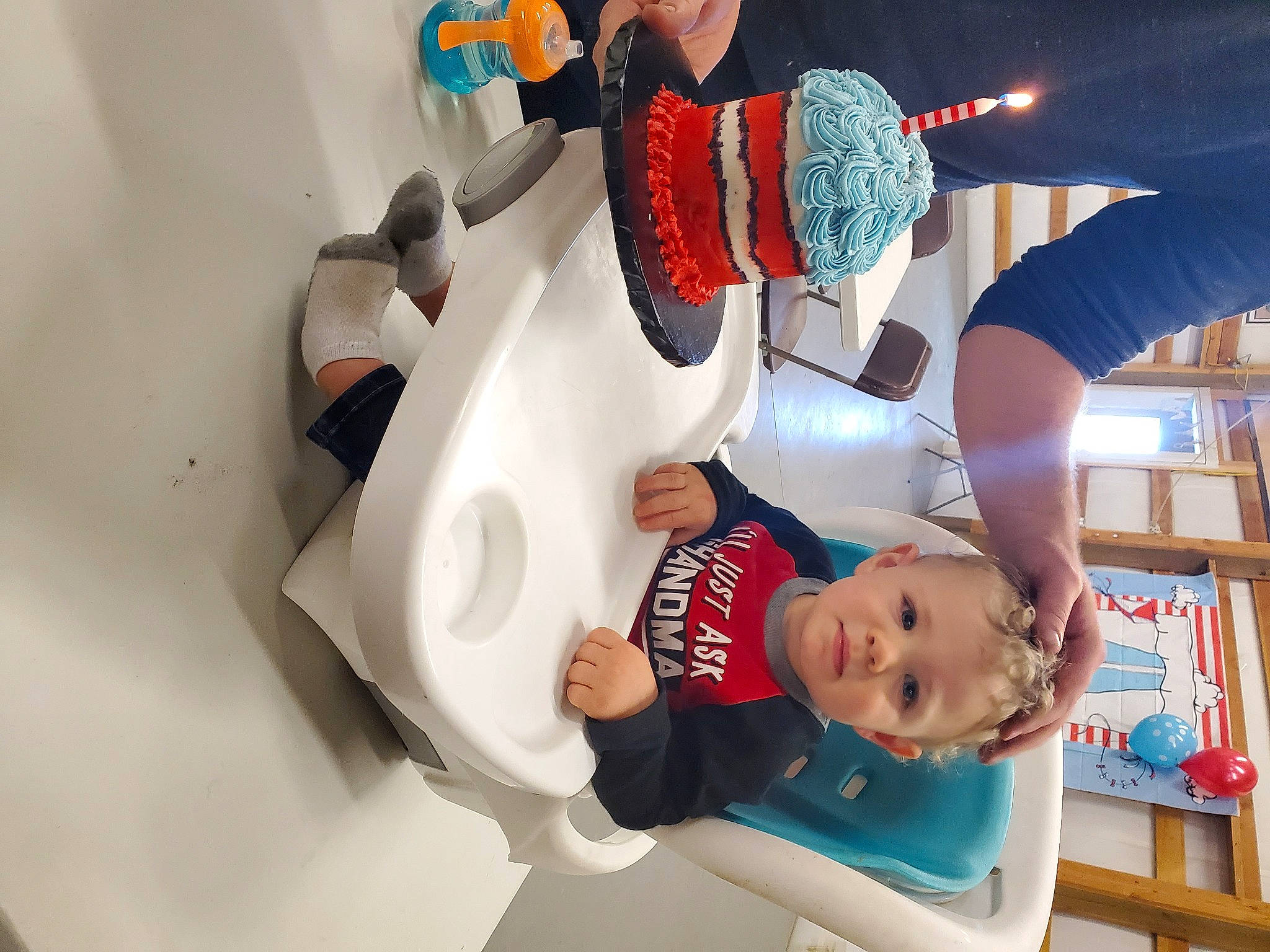 Jackson is registered to the contest to win money with this photo: baby, baby_products, bookcase, child, comfort, event, fun, gesture, happy, leisure, person, play, room, shelf, smile, t_shirt, thigh, toddler