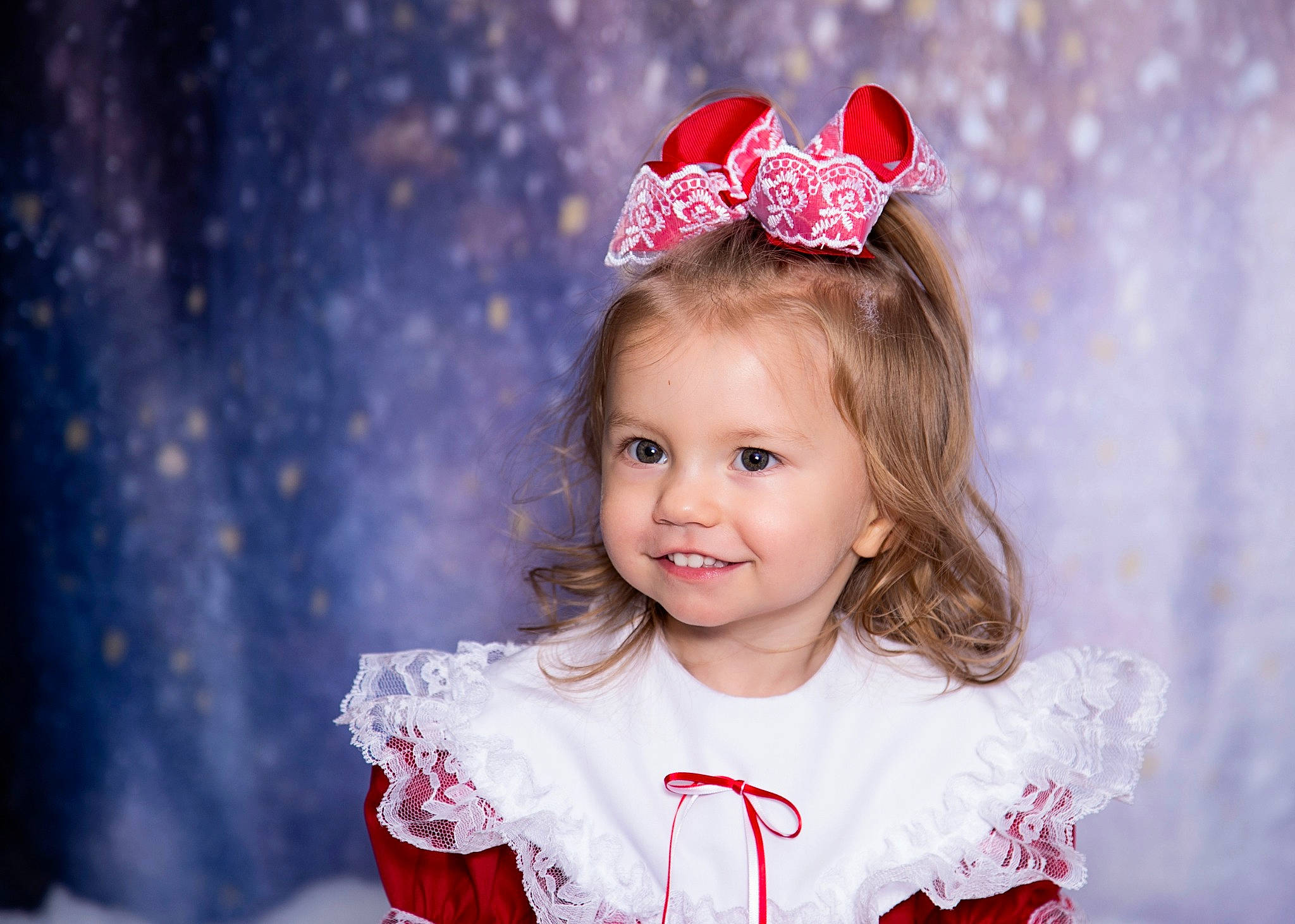 Edith is registered to the contest to win money with this photo: child, child_model, crown, dress, fashion_accessory, hair_accessory, happy, headband, headgear, headpiece, joy, person, photography, portrait_photography, red, smile, toddler