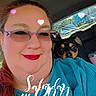 blue_clothing, car_interior, casual, cute, daylight, dog, friendship, glasses, happy, heart_graphic, indoor, leisure, pet, portrait, red_lipstick, seat, smile, text_overlay, window, woman