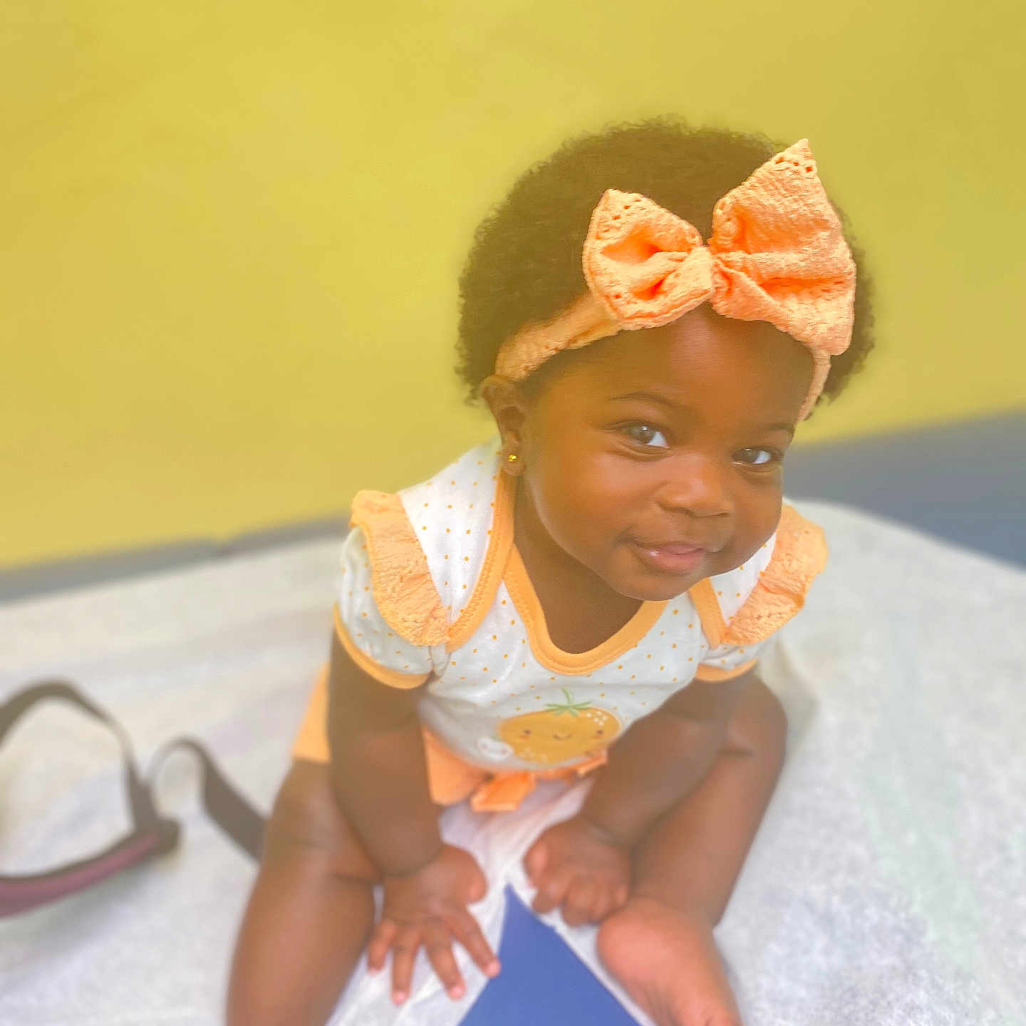 Autumn is registered to the contest to win money with this photo: accessories, baby, babycrawling, babylaughing, bonnet, clothing, crawling, dress, face, happy, hat, head, headband, jewelry, necklace, person, photography, portrait, sitting, smile