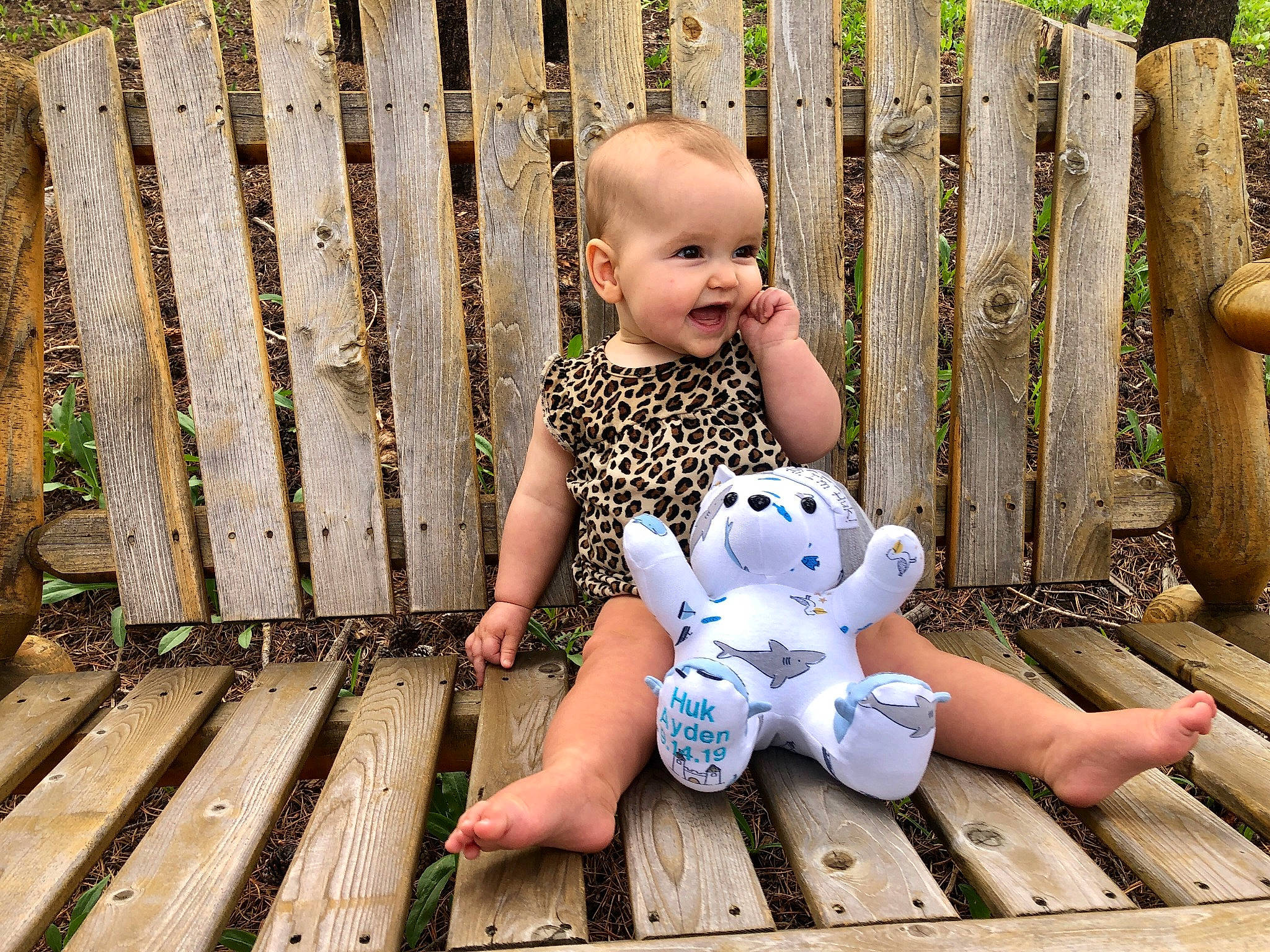 Ayden is registered to the contest to win money with this photo: baby, baby_toddler_clothing, child, fence, foot, fun, grass, happy, human_leg, leisure, people_in_nature, person, plant, sitting, skin, smile, snapshot, summer, thigh, toddler