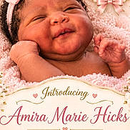 Amira is registered to the contest to win money with this photo: newborn, baby, infant, portrait, smiling, sleepy, pink, blanket, headband, bow, floral, flowers, birth_announcement, text, girl, lying_down, close_up, face, hands, studio_photo