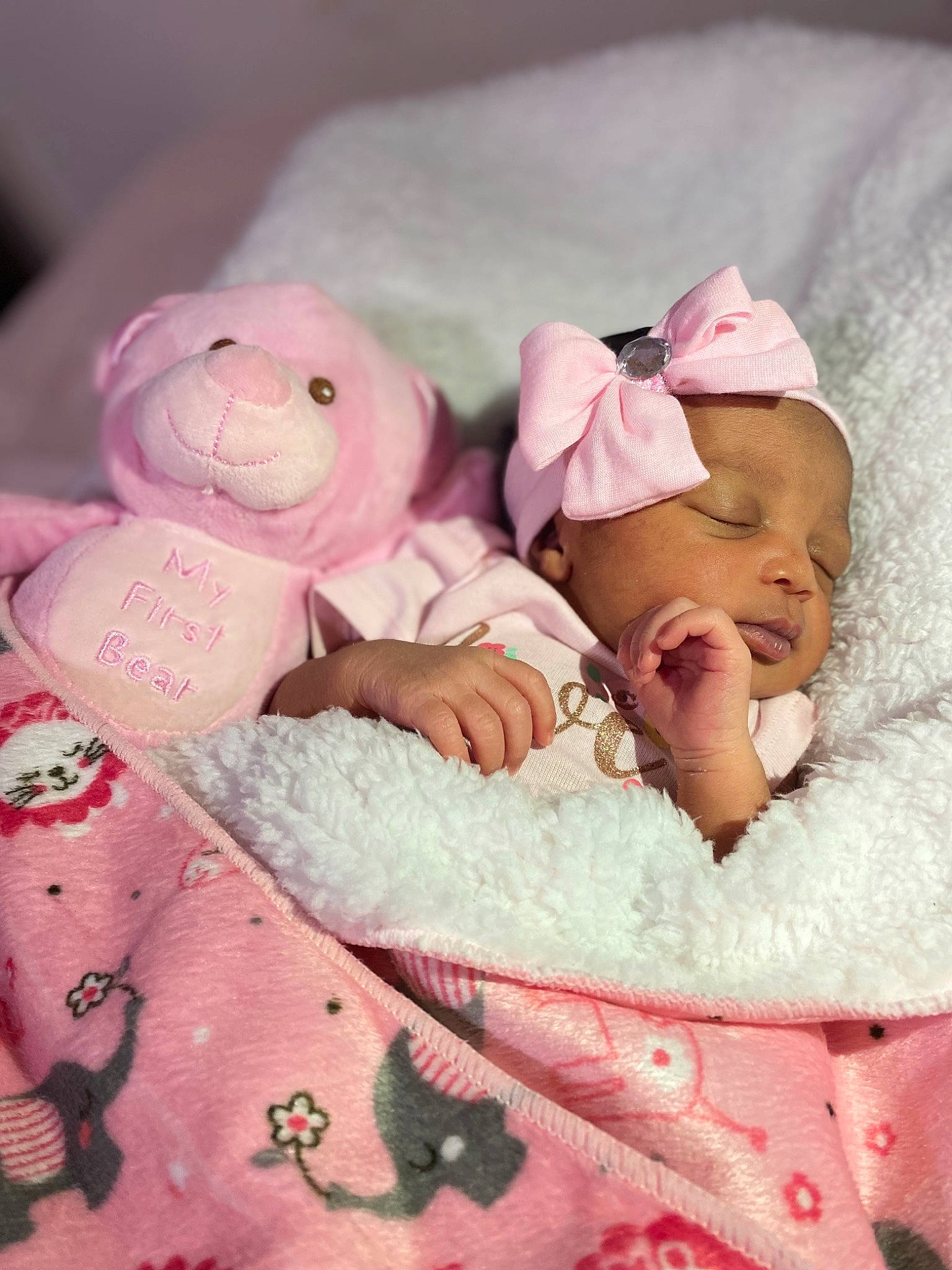 Taryah joined the competition — help win amazing prizes! baby, baby_sleeping, baby_toddler_clothing, cheek, chin, comfort, eye, face, finger, hand, happy, head, headgear, human_body, linens, person, petal, pink, skin, textile