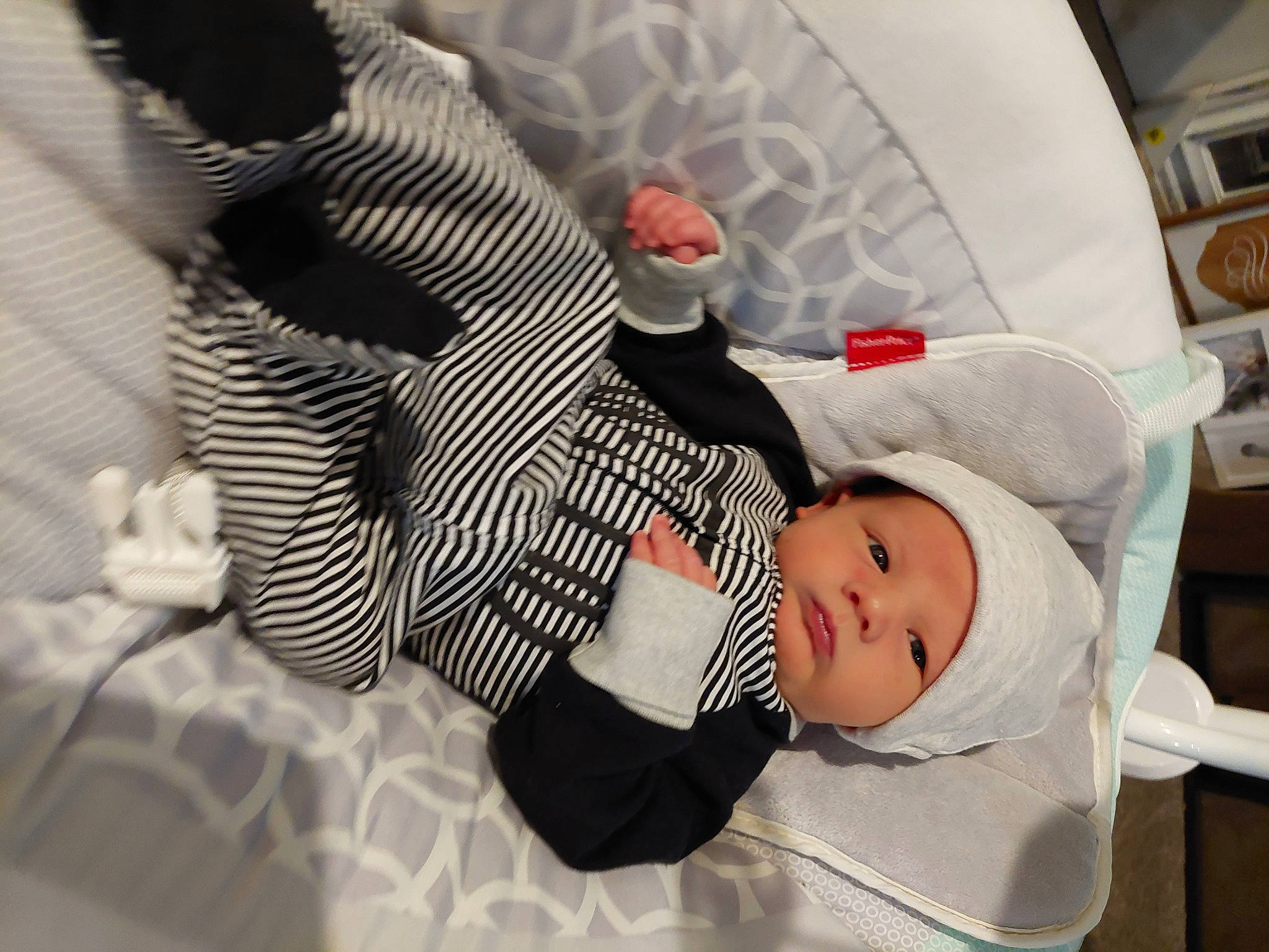 Aeson is registered to the contest to win money with this photo: baby, baby_carriage, baby_products, baby_safety, baby_sleeping, baby_toddler_clothing, carmine, child, comfort, gesture, hat, headgear, headwear, nap, pattern, person, room, sitting, toddler