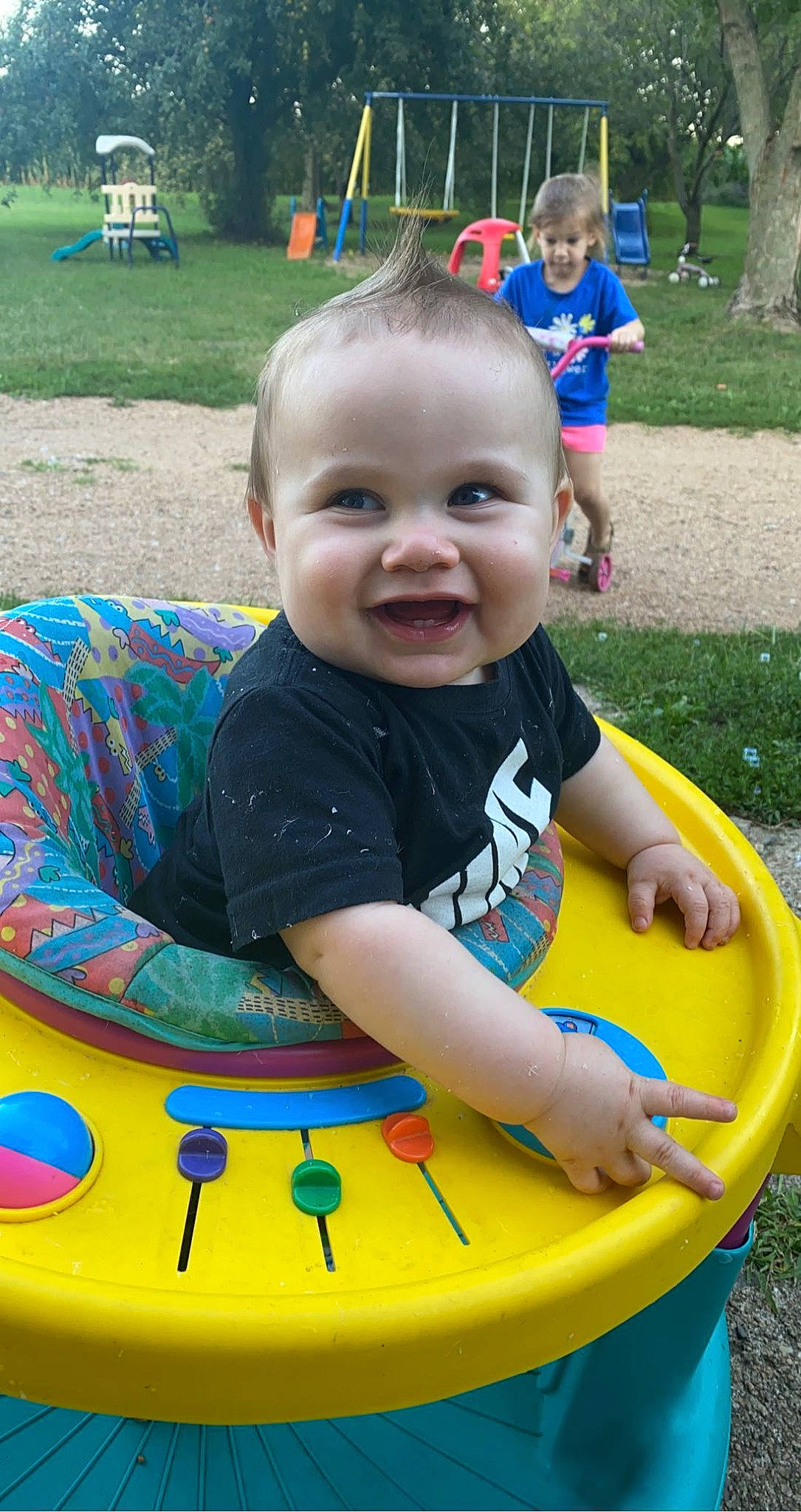 Oaklinn joined the competition — help win amazing prizes! baby, baby_toddler_clothing, child, event, facial_expression, fun, games, grass, green, happy, joy, leisure, person, photograph, plant, public_space, recreation, sitting, smile, summer