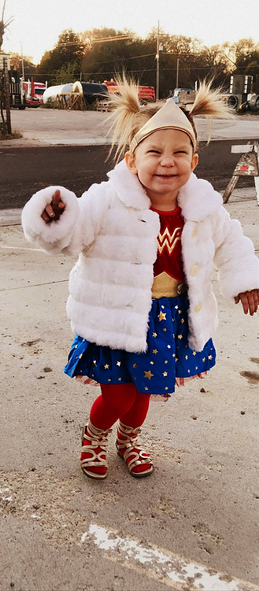 Aris is registered to the contest to win money with this photo: baby_toddler_clothing, child, cool, costume, electric_blue, fashion_accessory, freezing, fun, fur, happy, headwear, joy, pattern, person, pink, play, portrait_photography, sleeve, smile, sock