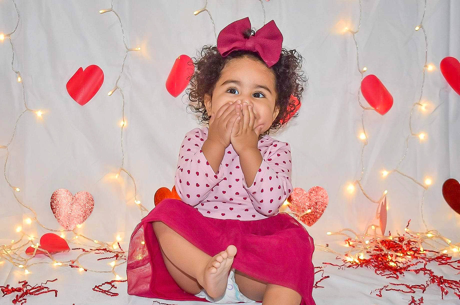 Adrienne joined the competition — help win amazing prizes! child, christmas, christmas_eve, happy, heart, holiday, party_hat, party_supply, person, photo_shoot, photography, pink, red, sitting, skin, toddler, valentines_day