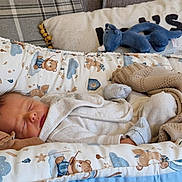 Albie joined the competition — help win amazing prizes! newborn, baby, sleeping, blanket, plush_toy, knitted_blanket, cushion, bed, clothing, infant, peaceful, cute, soft, indoors, resting, teddy_bear_pattern, cozy, child, portrait, cute_baby