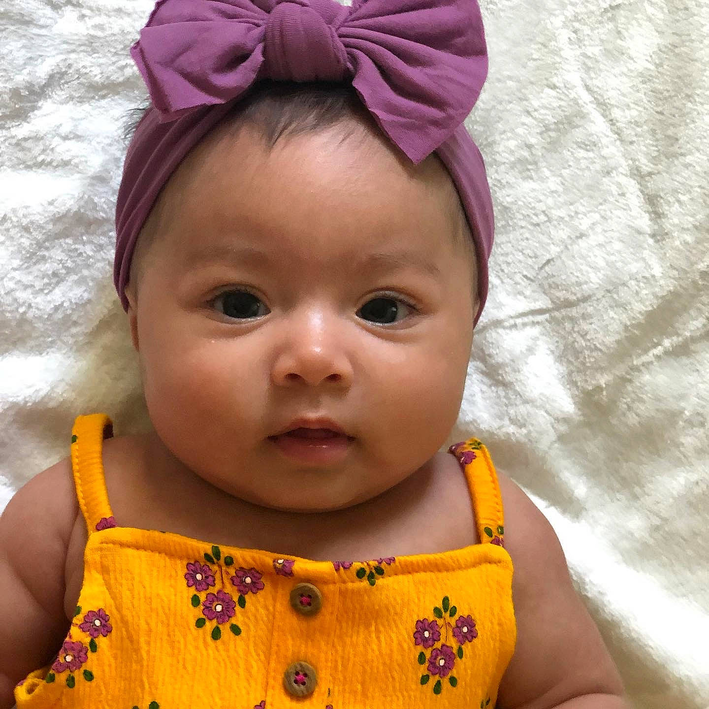 Maisy is registered to the contest to win money with this photo: baby, cheek, child, ear, eye, face, fashion_accessory, forehead, hair_accessory, head, headband, headgear, headwear, lip, mouth, neck, nose, person, skin, smile