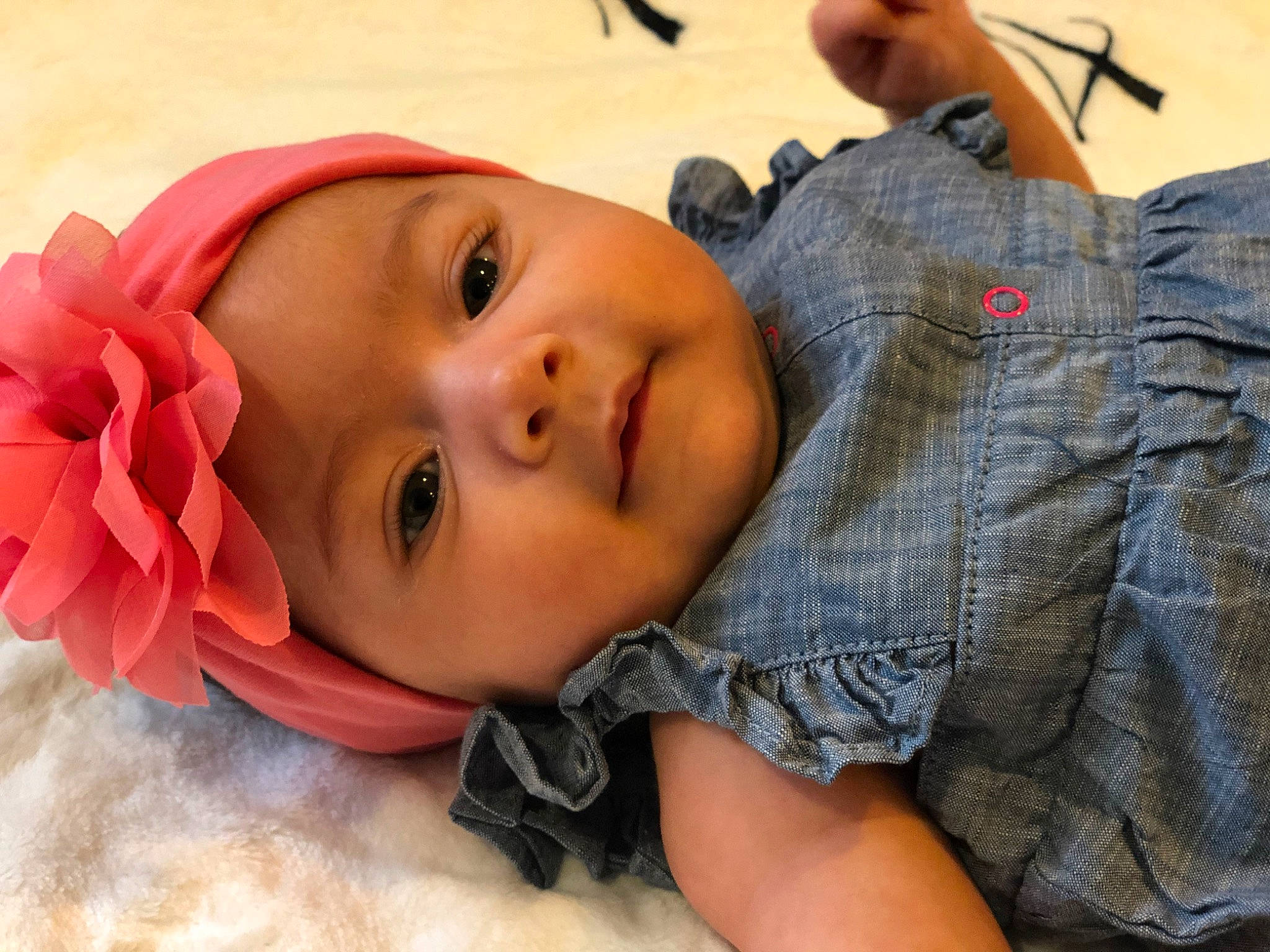 Maisy is registered to the contest to win money with this photo: baby, cheek, child, chin, close_up, ear, eye, face, forehead, fun, head, headgear, headwear, lip, mouth, muscle, nose, organ, person, pink