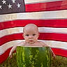 Larkin is registered to the contest to win money with this photo: american_flag, baby, background, blue, child, cute, fruit, grass, green, head, legs, nature, outdoor, patriotic, red, sitting, skin, summer, watermelon, white