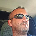 Gregory C.