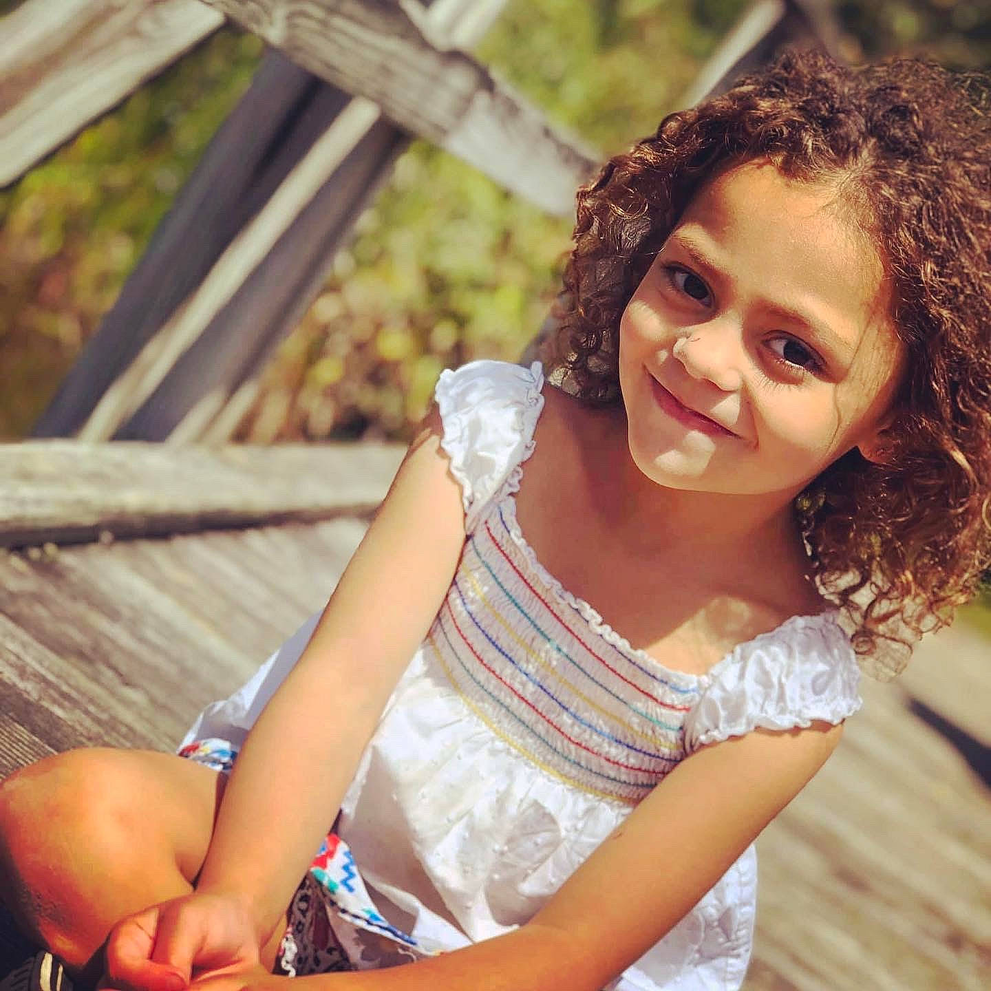 Nevaeh joined the competition — help win amazing prizes! black_hair, child, cool, daytime, eye, flash_photography, fun, grass, happy, head, human_leg, joy, leisure, lip, long_hair, people_in_nature, person, shoulder, skin, smile