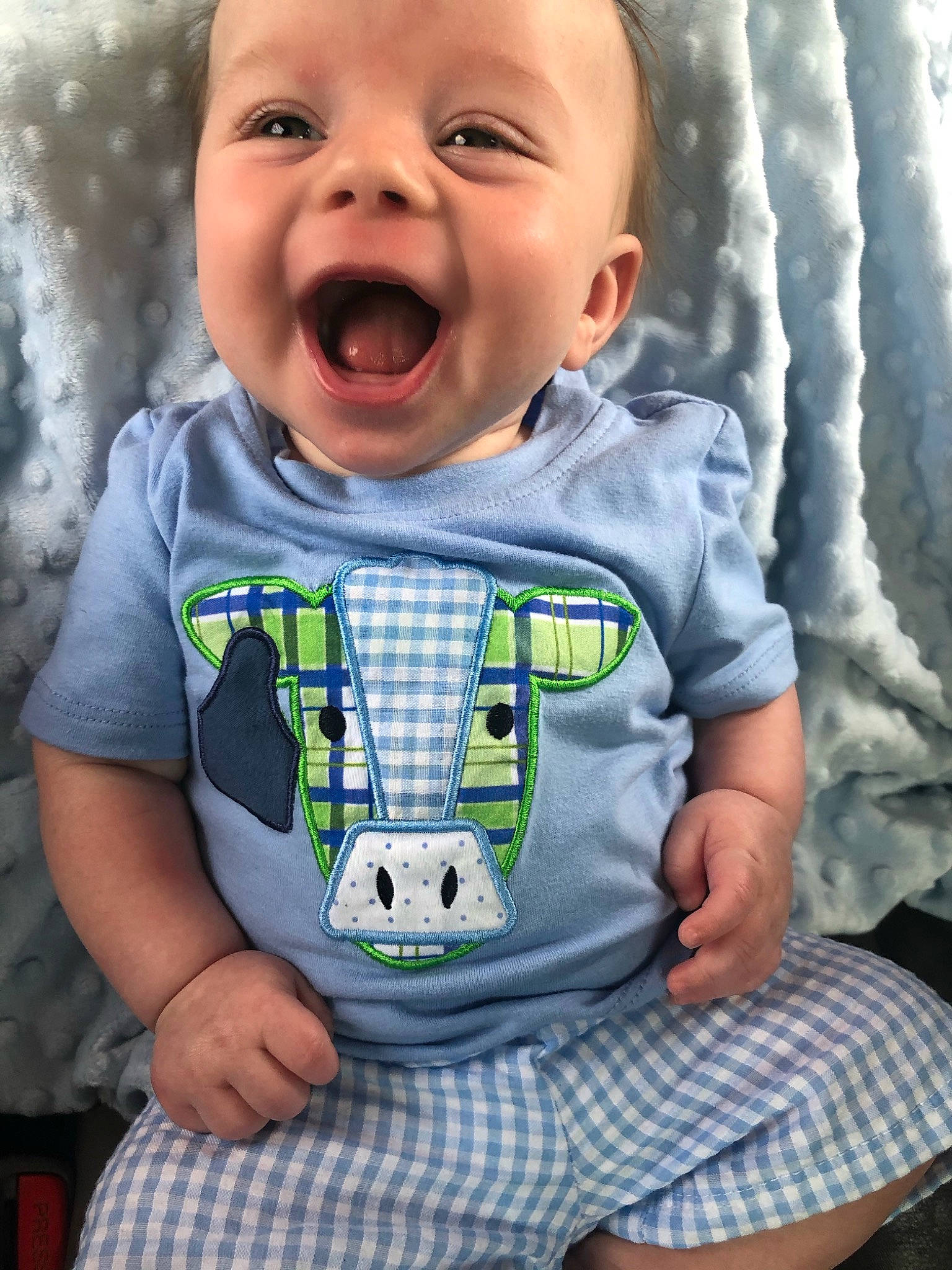 Huxley joined the competition — help win amazing prizes! baby, baby_products, baby_toddler_clothing, child, design, facial_expression, pattern, person, plaid, product, sleeve, smile, t_shirt, toddler