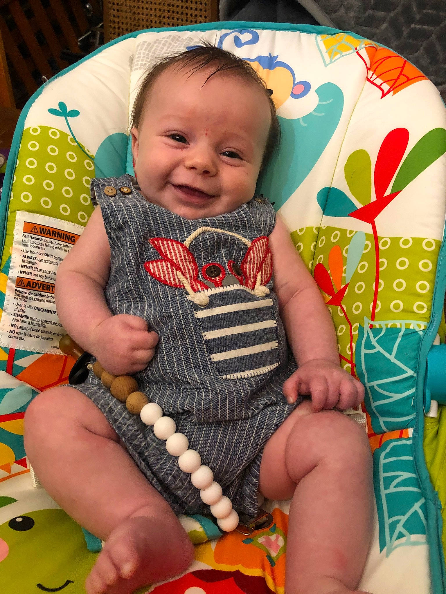 Huxley is registered to the contest to win money with this photo: baby, baby_products, baby_toys, cheek, child, finger, joy, person, play, product, sitting, skin, smile, textile, toddler, toy