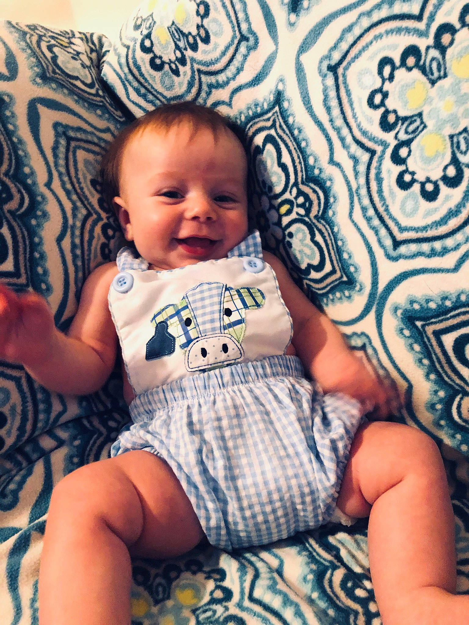 Huxley is registered to the contest to win money with this photo: baby, baby_toddler_clothing, child, diaper, leg, pattern, person, sitting, toddler