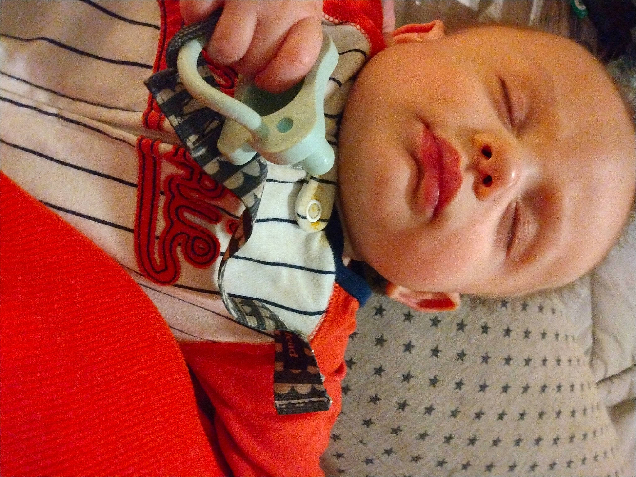 Beau is registered to the contest to win money with this photo: baby, baby_toddler_clothing, carmine, cheek, child, comfort, eyelash, finger, happy, human_body, lip, mouth, nail, nose, pattern, person, skin, sleeve, thumb, toddler