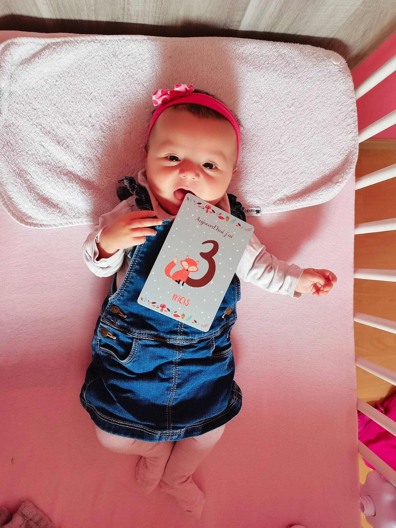 Soline participe au concours pour gagner de l'argent avec cette photo : baby, baby_toddler_clothing, cap, cheek, child, electric_blue, face, finger, happy, hat, outerwear, pattern, person, pink, product, skin, sleeve, smile, t_shirt, textile