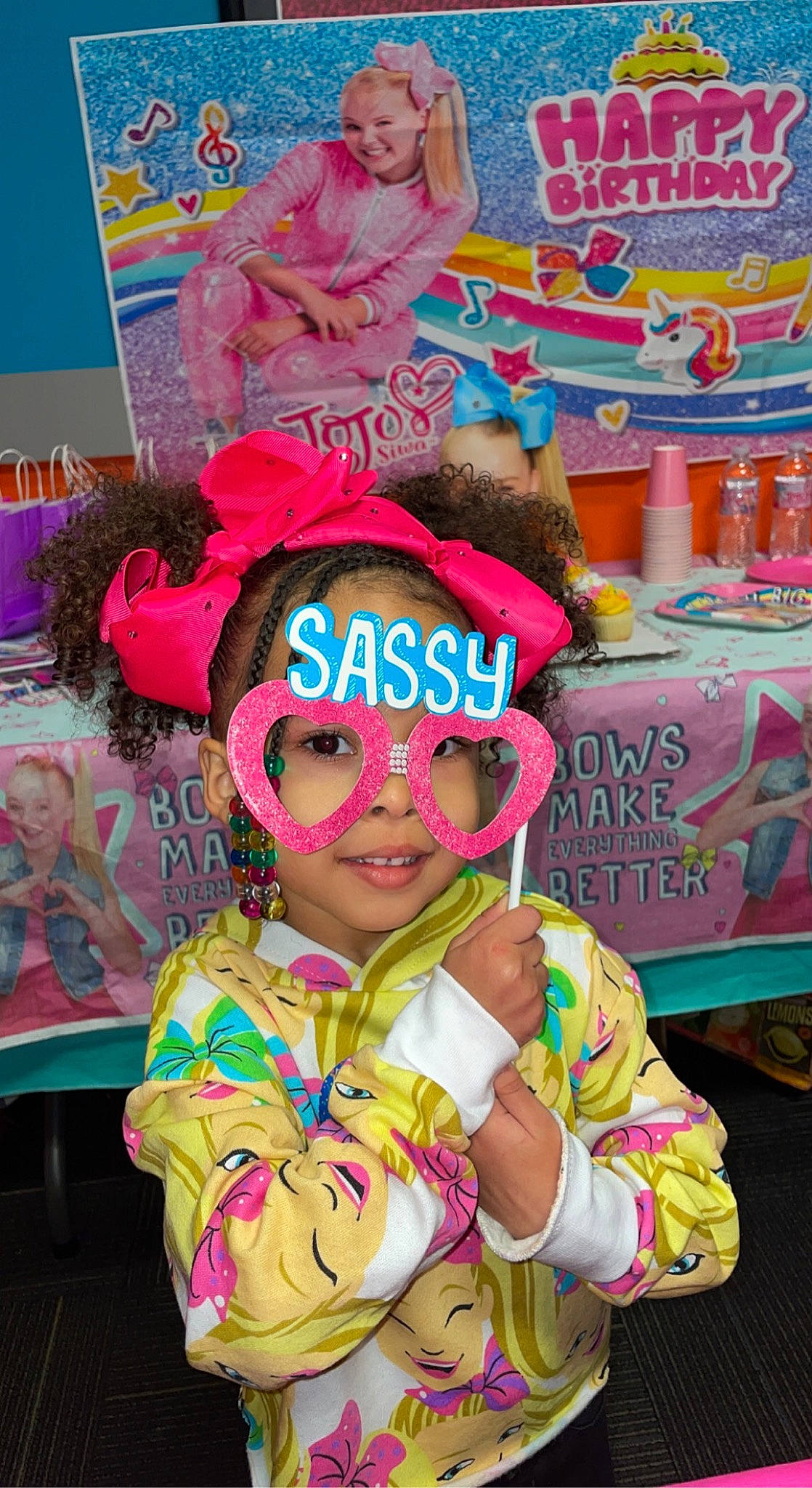 Ariah is registered to the contest to win money with this photo: art, cap, child, entertainment, event, eyewear, fun, goggles, happy, headgear, headwear, joy, leisure, magenta, party_supply, person, pink, purple, room, smile