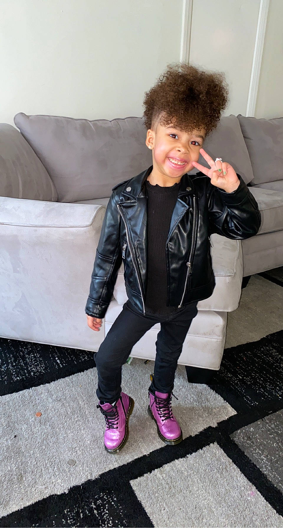 Ariah joined the competition — help win amazing prizes! blazer, clothing, collar, comfort, couch, dress_shirt, eye, face, furniture, happy, head, jacket, joy, leather_jacket, leg, lip, outerwear, person, sleeve, smile