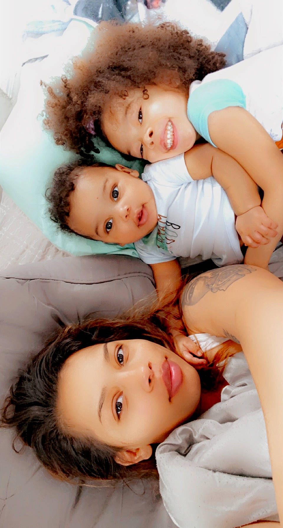 Liam is registered to the contest to win money with this photo: cheek, comfort, eye, face, facial_expression, gesture, hairstyle, happy, head, human, interaction, lip, mammal, mouth, muscle, organ, person, photograph, product, skin