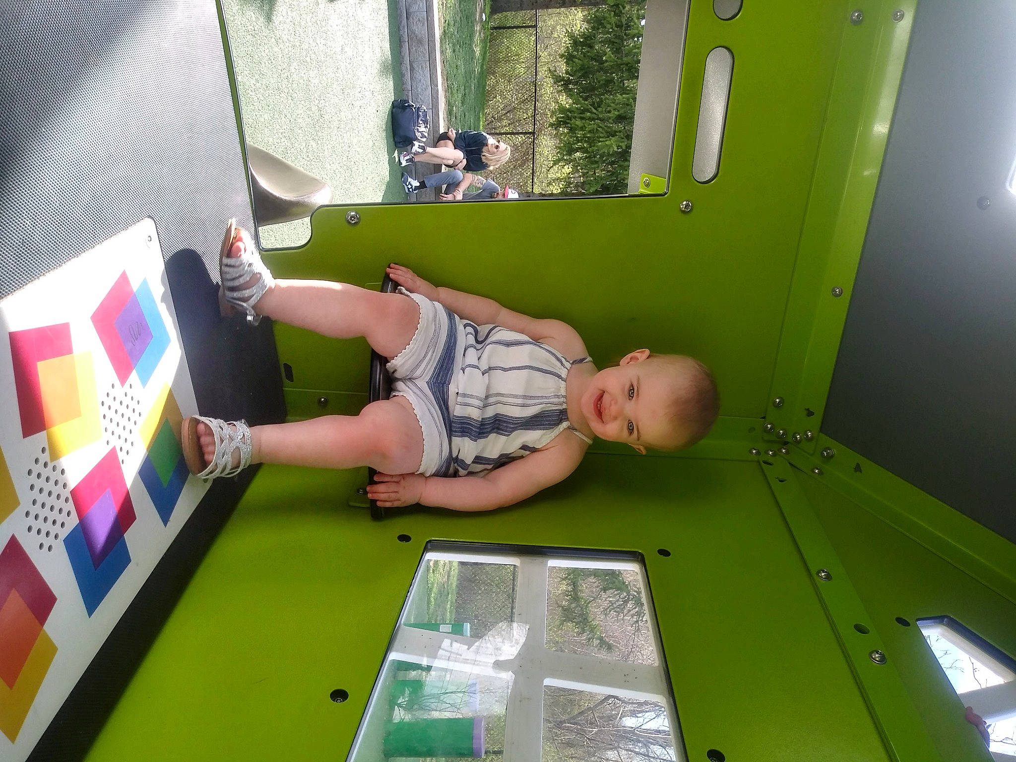 Brookelynn is registered to the contest to win money with this photo: chair, child, flooring, fun, games, grass, green, joy, leisure, person, play, recreation, room, shirt, shorts, smile, t_shirt, toddler, visual_arts