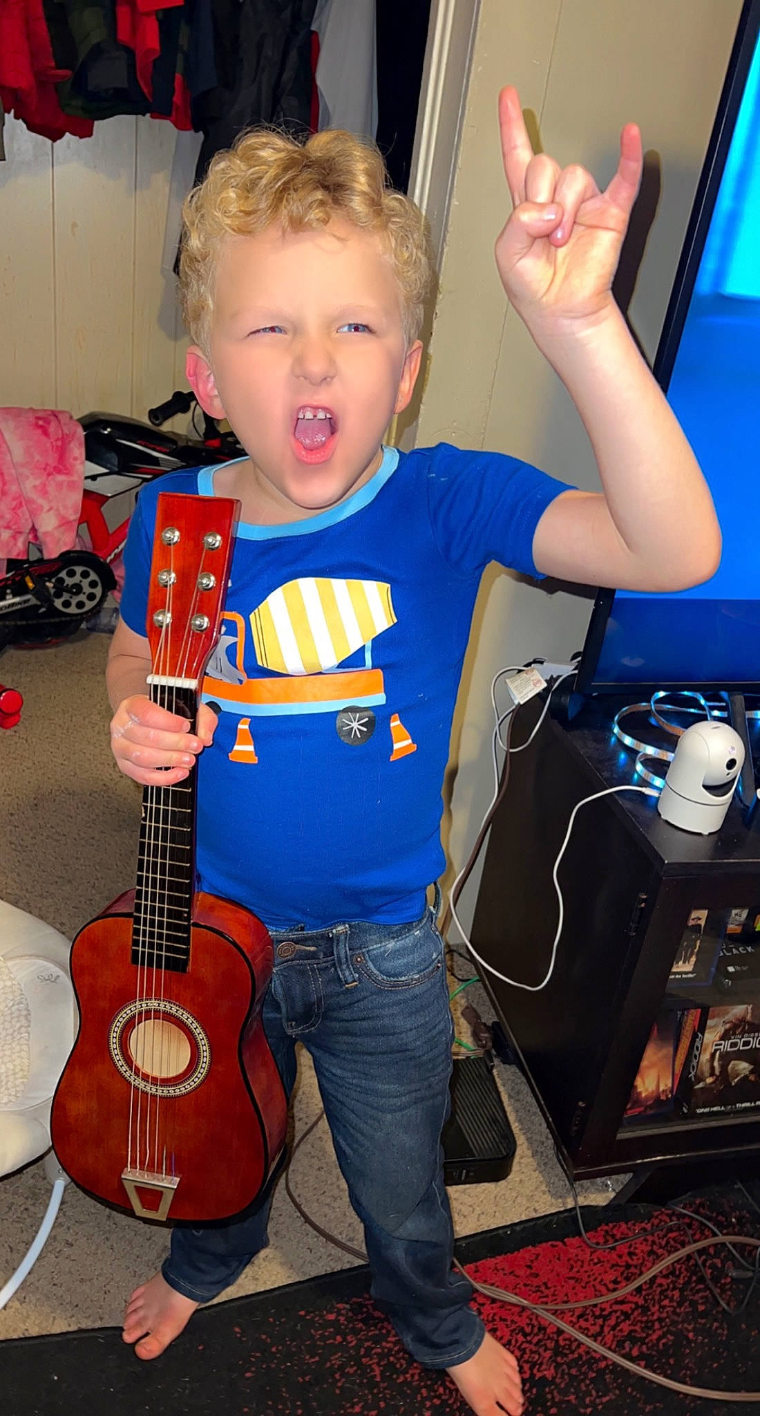 Tristan joined the competition — help win amazing prizes! acoustic_guitar, anger, audio_equipment, electric_blue, electric_guitar, electronic_instrument, electronic_musical_instrument, finger, fun, guitar, guitar_accessory, jeans, musical_instrument, musical_instrument_accessory, musician, person, plucked_string_instruments, string_instrument, string_instrument_accessory, t_shirt