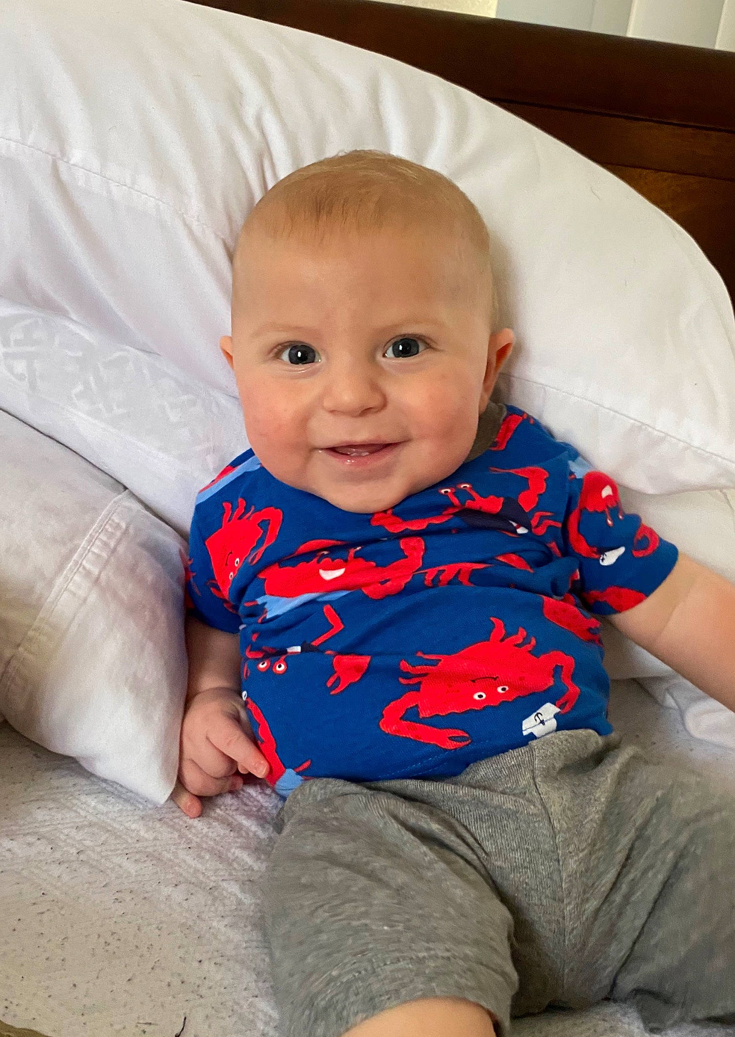 Iver is registered to the contest to win money with this photo: baby, baby_products, baby_toddler_clothing, cheek, child, eye, face, head, lip, nose, person, product, sitting, skin, sleeve, smile, toddler