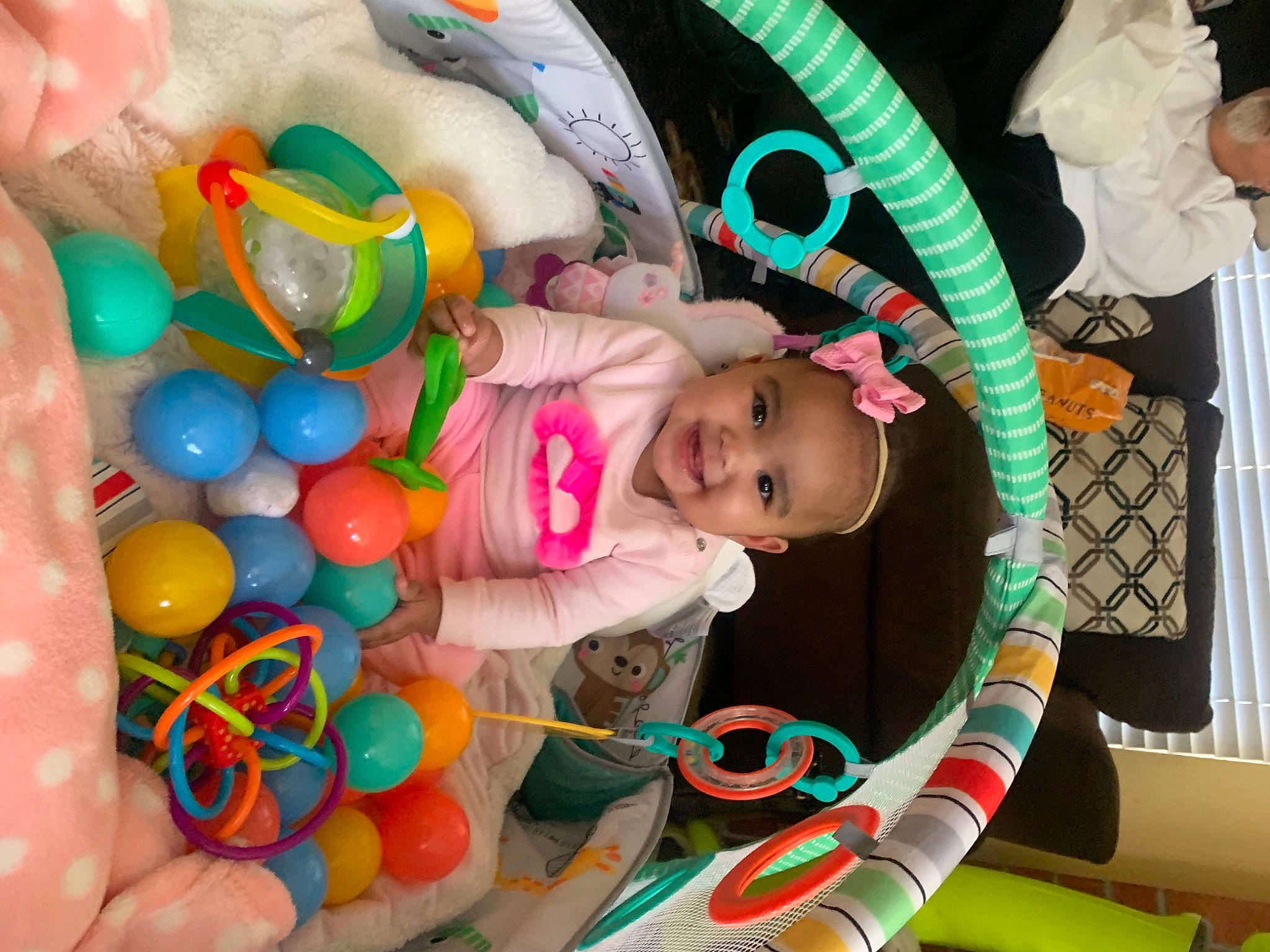 Auria H is registered to the contest to win money with this photo: baby, baby_products, baby_toddler_clothing, baby_toys, child, event, fun, green, happy, headwear, iris, joy, mammal, people, person, pink, play, room, snapshot, stuffed_toy