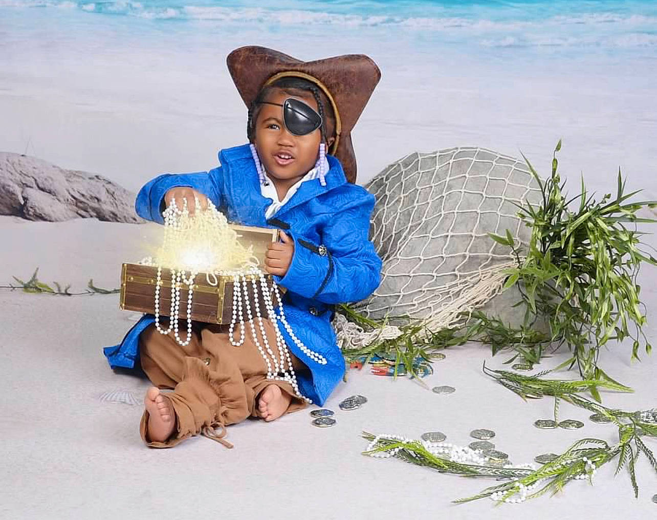 Meirah joined the competition — help win amazing prizes! adaptation, child, fun, grass, happy, hat, headwear, landscape, leisure, ocean, people_in_nature, person, plant, sand, sitting, smile, sun_hat, sunglasses, travel, vacation