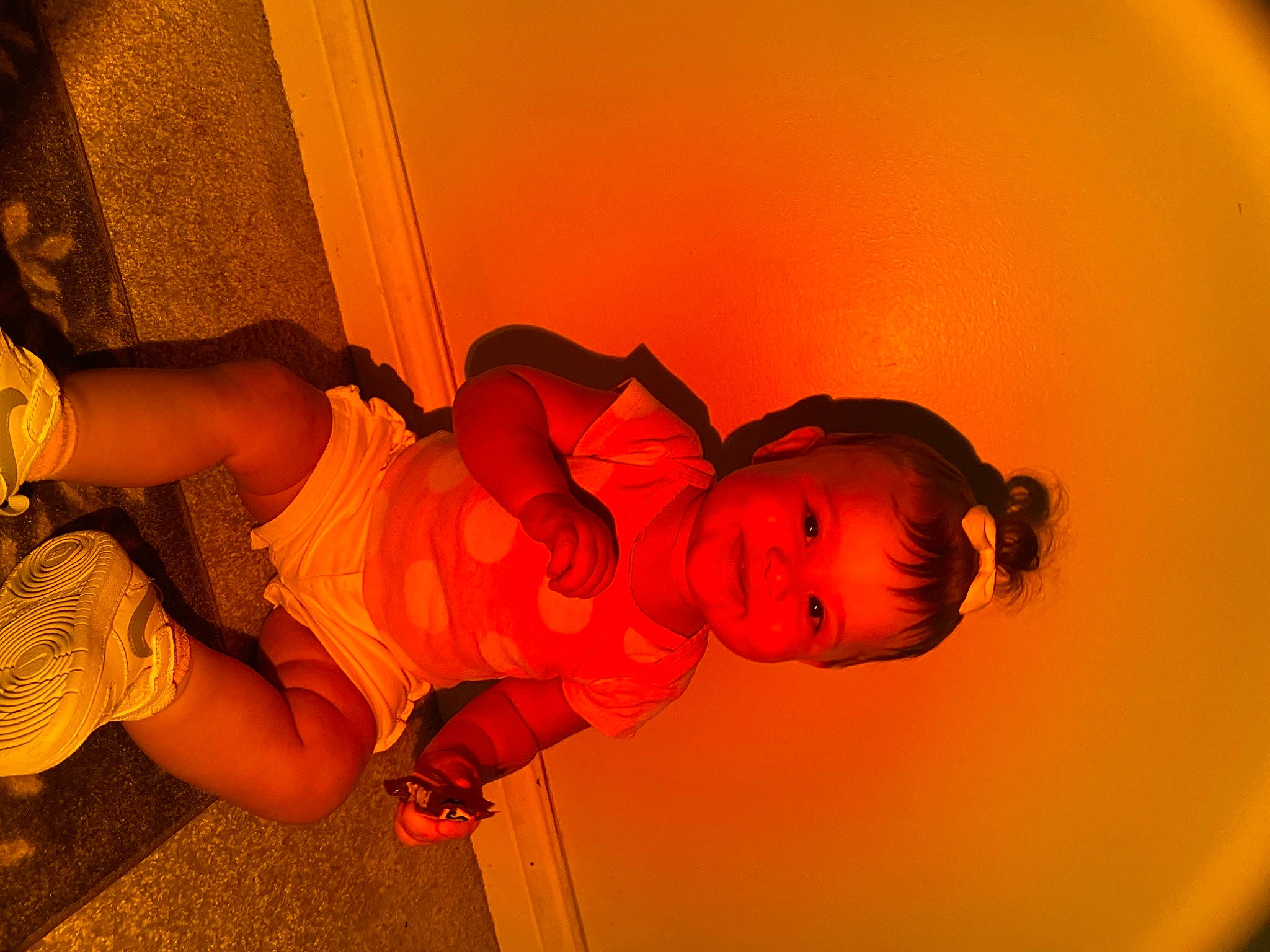 Akira is registered to the contest to win money with this photo: amber, baby, child, dress, flash_photography, flooring, fun, happy, heat, human_leg, joy, lighting, mouth, nose, orange, person, room, skin, sky, smile