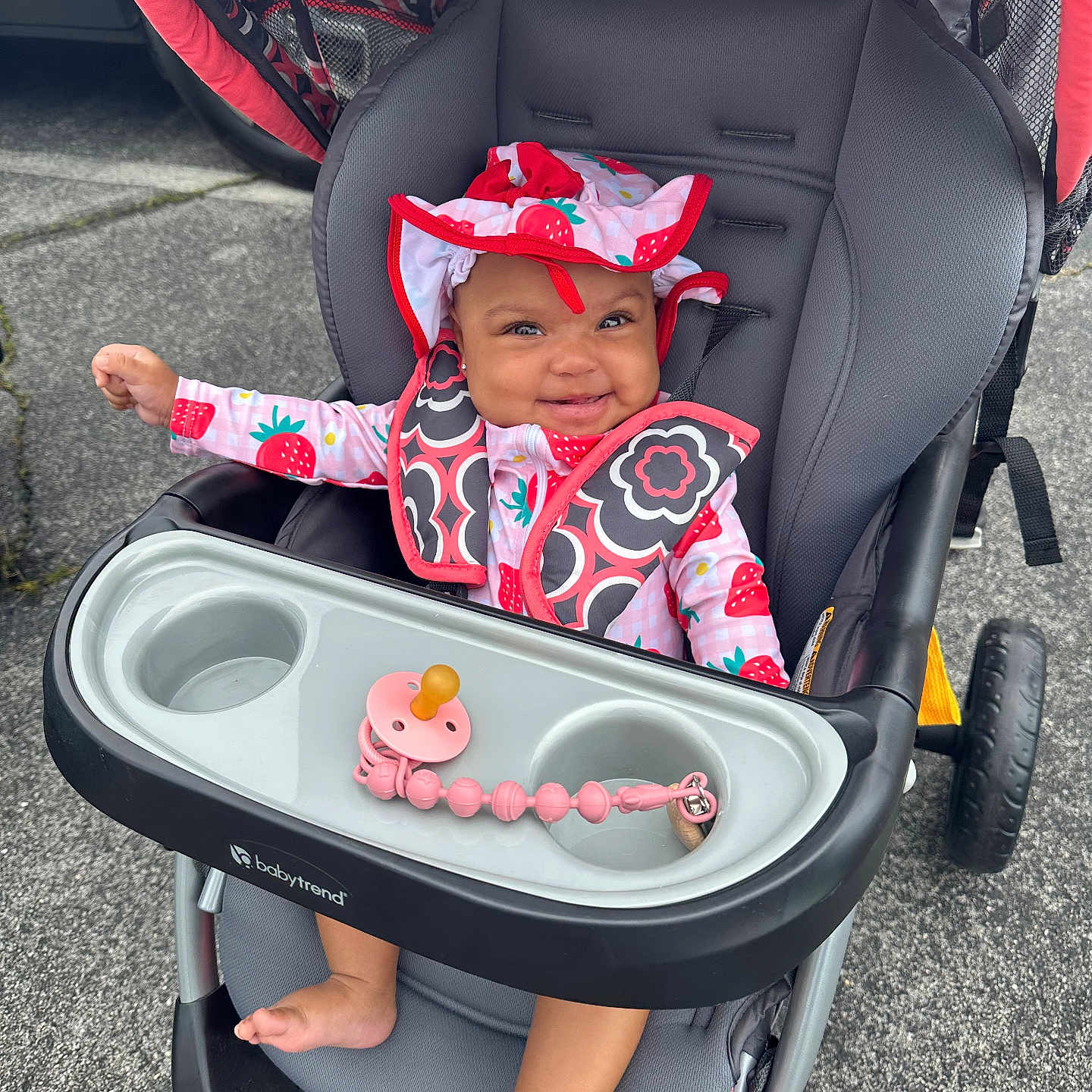 Desyah joined the competition — help win amazing prizes! baby, bonnet, cap, clothing, coat, dress, face, happy, hat, head, jacket, machine, person, photography, portrait, smile, stroller, transportation, vehicle, wheel