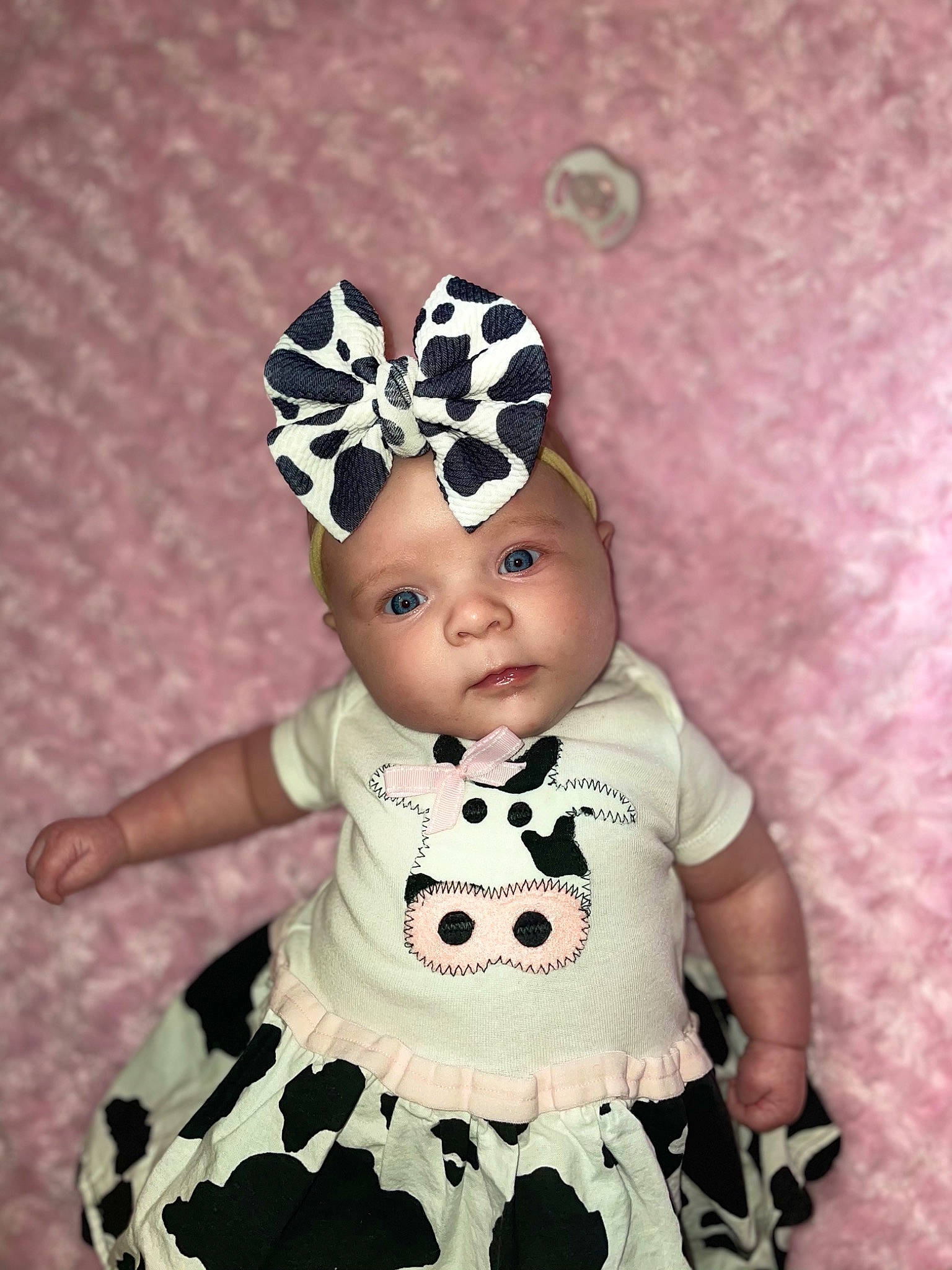 Kaydence joined the competition — help win amazing prizes! baby, baby_toddler_clothing, costume_hat, day_dress, dress, embellishment, eyelash, hair_accessory, headband, headgear, headpiece, headwear, jewellery, magenta, pattern, person, pink, purple, sleeve, textile