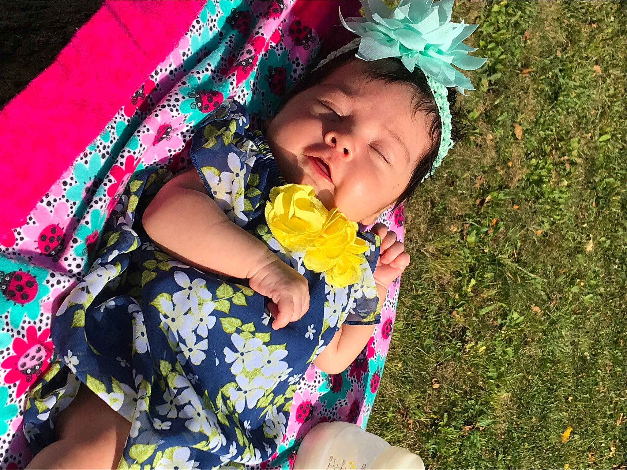 Mireya is registered to the contest to win money with this photo: baby, baby_products, baby_toddler_clothing, child, fashion_accessory, flower, fun, grass, hair_accessory, happy, headgear, lei, person, pink, plant, product, smile, spring, summer, toddler