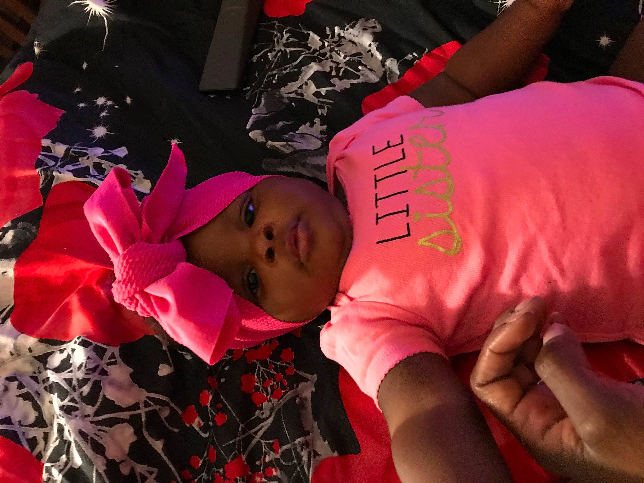 Devorah is registered to the contest to win money with this photo: child, finger, flesh, hand, human, nail, person, pink, toddler