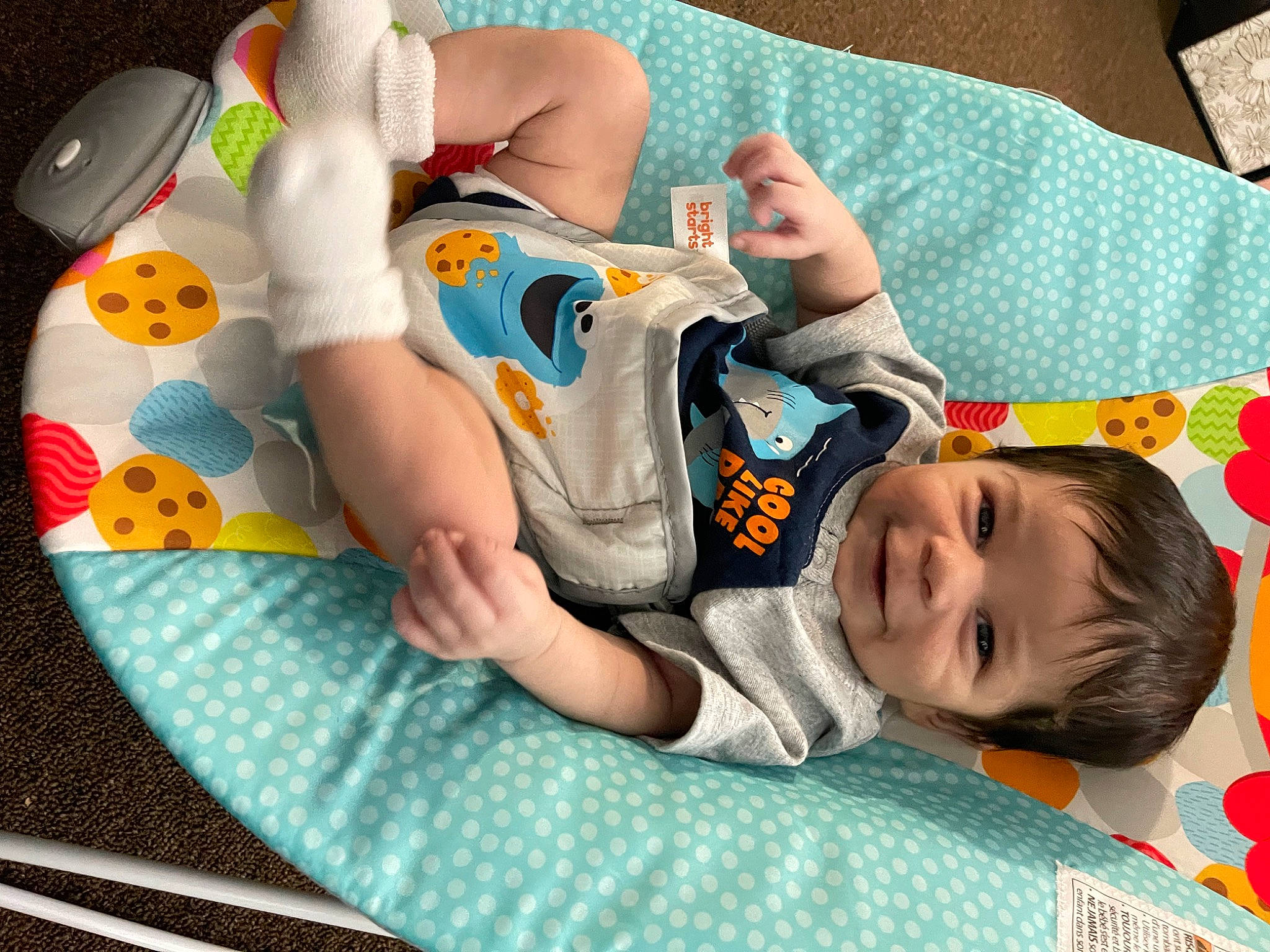 Aron joined the competition — help win amazing prizes! baby, baby_products, baby_sleeping, baby_toddler_clothing, child, comfort, fun, green, hand, happy, joy, linens, pattern, person, room, sitting, sleeve, smile, t_shirt, textile