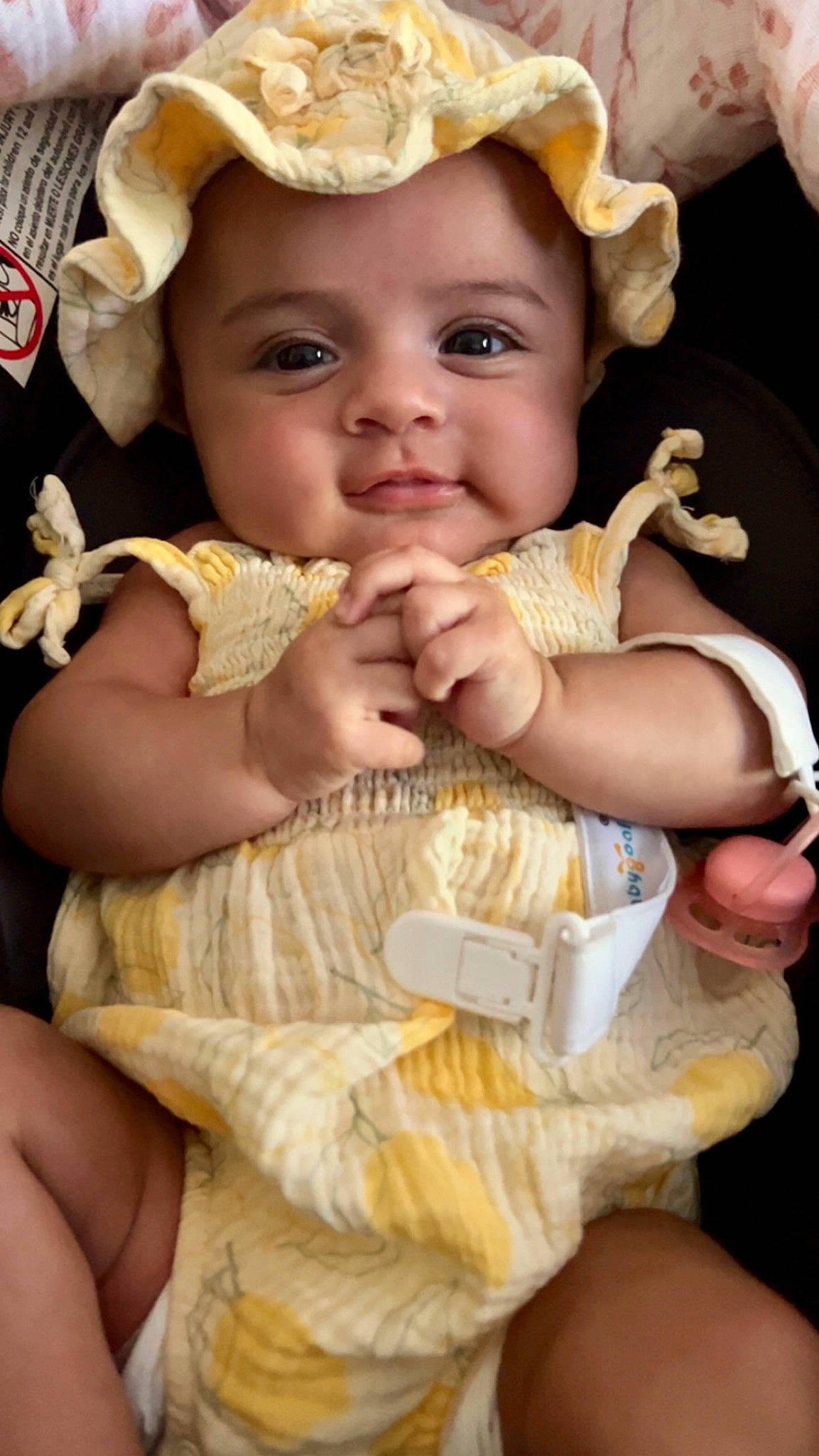 Reya is registered to the contest to win money with this photo: baby, baby_toddler_clothing, child, cuisine, dish, eye, finger, food_craving, gesture, hand, happy, headwear, jewellery, mouth, nail, person, sitting, skin, sweetness, thumb