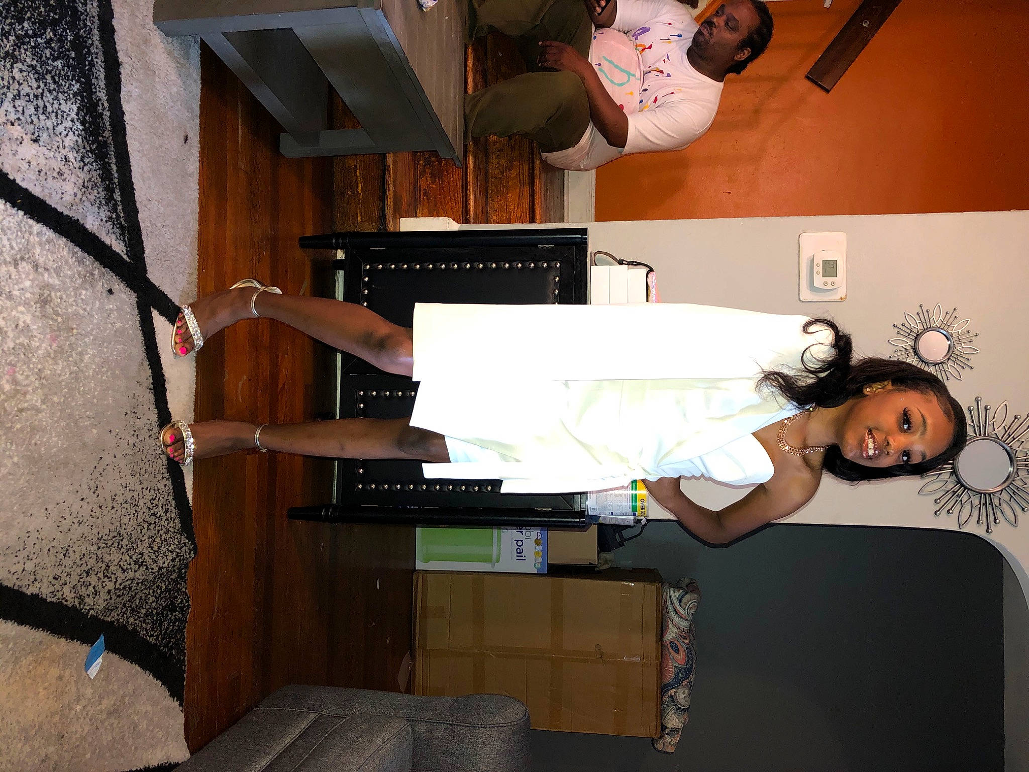 Kennedy is registered to the contest to win money with this photo: furniture, person, room