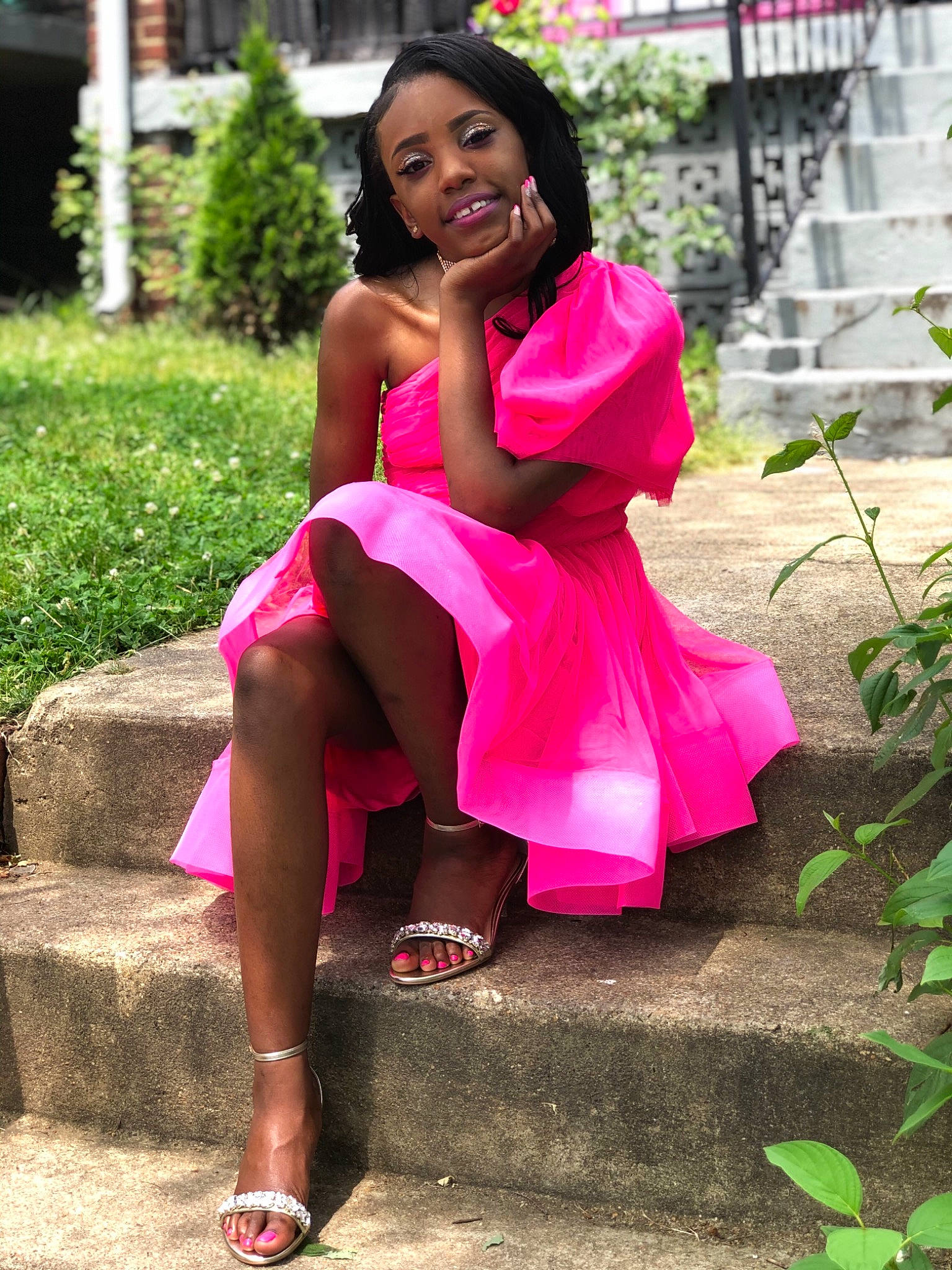 Kennedy joined the competition — help win amazing prizes! beauty, black_hair, brown_hair, clothing, cocktail_dress, dress, fashion, finger, human_leg, joy, leg, leisure, long_hair, magenta, model, person, photo_shoot, pink, red, sitting