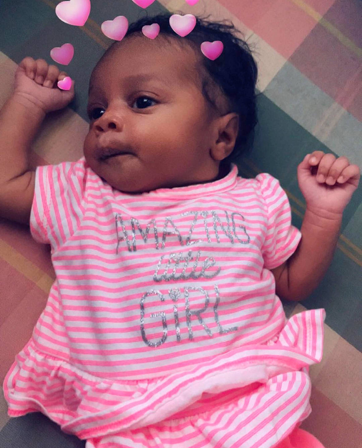 Takyla is registered to the contest to win money with this photo: arm, baby_toddler_clothing, cheek, chin, ear, eye, eyebrow, eyelash, face, facial_expression, hairstyle, hand, head, lip, mouth, nose, organ, person, skin, smile