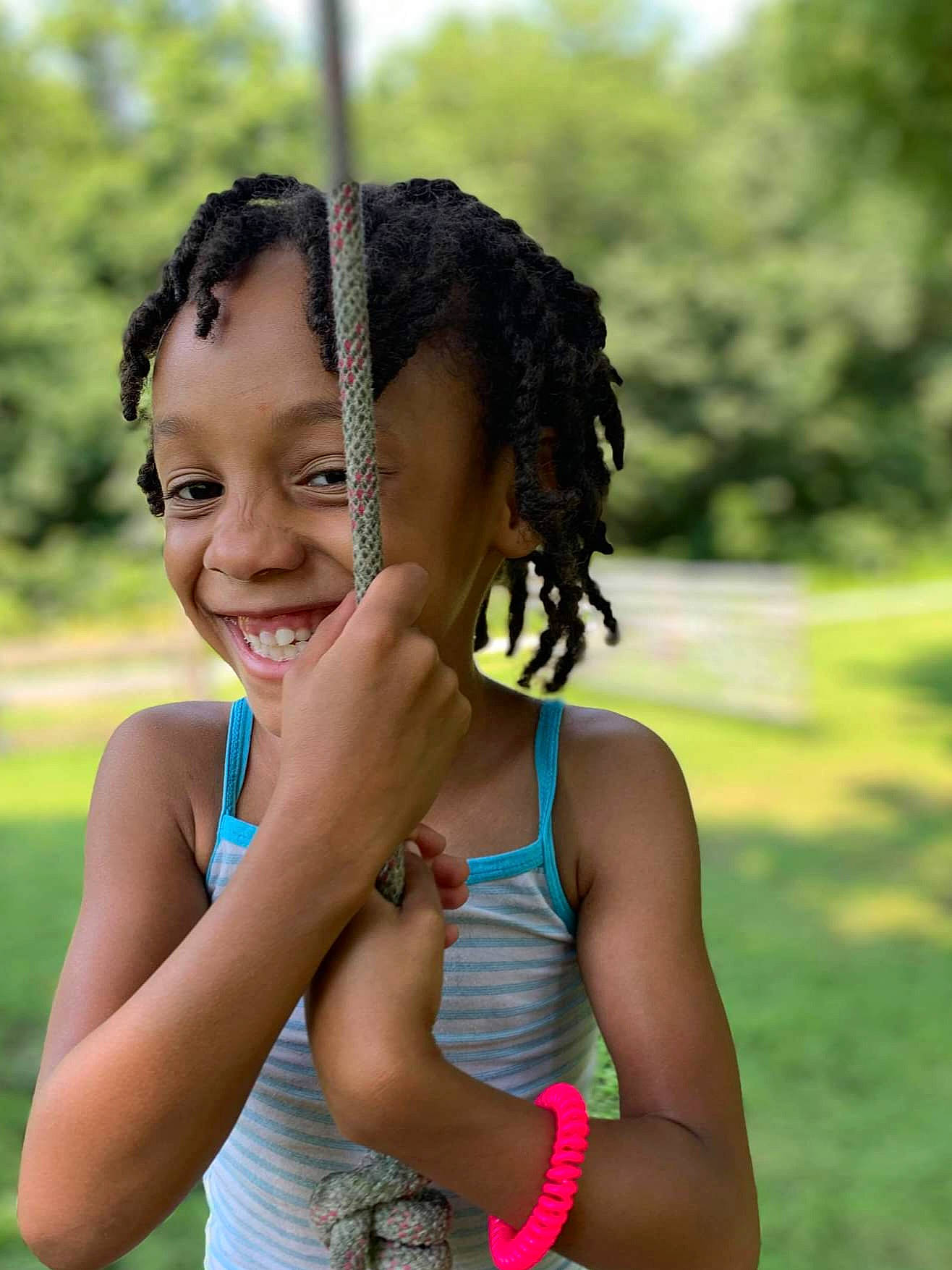 Giavanna is registered to the contest to win money with this photo: arm, black_hair, face, facial_expression, flash_photography, fun, gesture, grass, hairstyle, hand, happy, jewellery, joint, joy, leisure, long_hair, people_in_nature, person, shoulder, smile