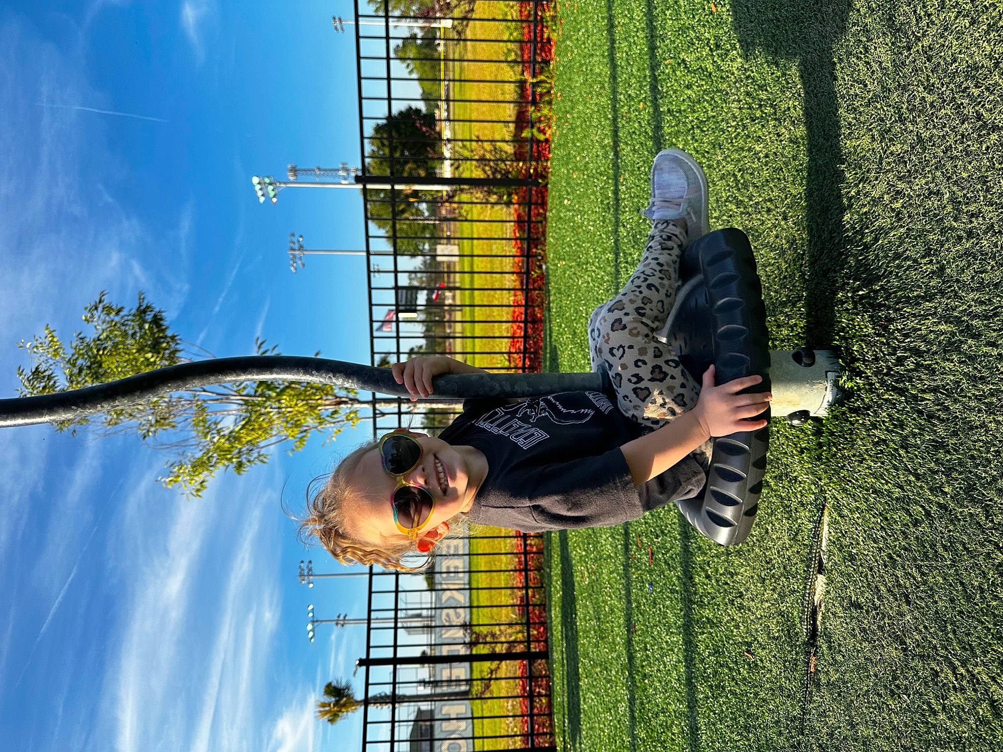 Calina is registered to the contest to win money with this photo: cloud, fun, grass, happy, hat, joy, leisure, mesh, net, people_in_nature, person, pole, recreation, shorts, sky, tree, yellow