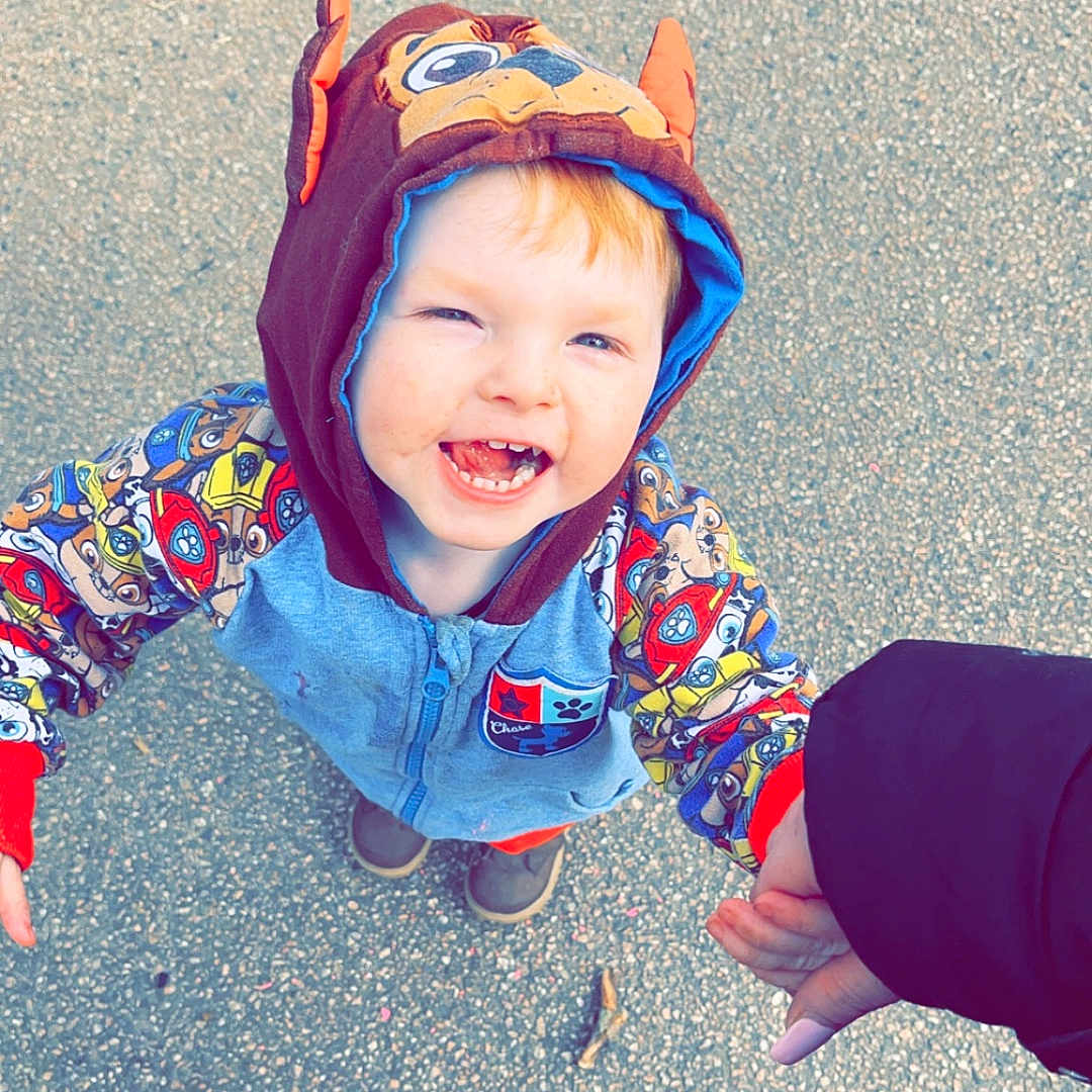 Harrison-Robert joined the competition — help win amazing prizes! baby, city, clothing, coat, face, hat, head, hood, hoodie, jacket, knitwear, pants, person, photography, portrait, road, street, sweater, sweatshirt, urban