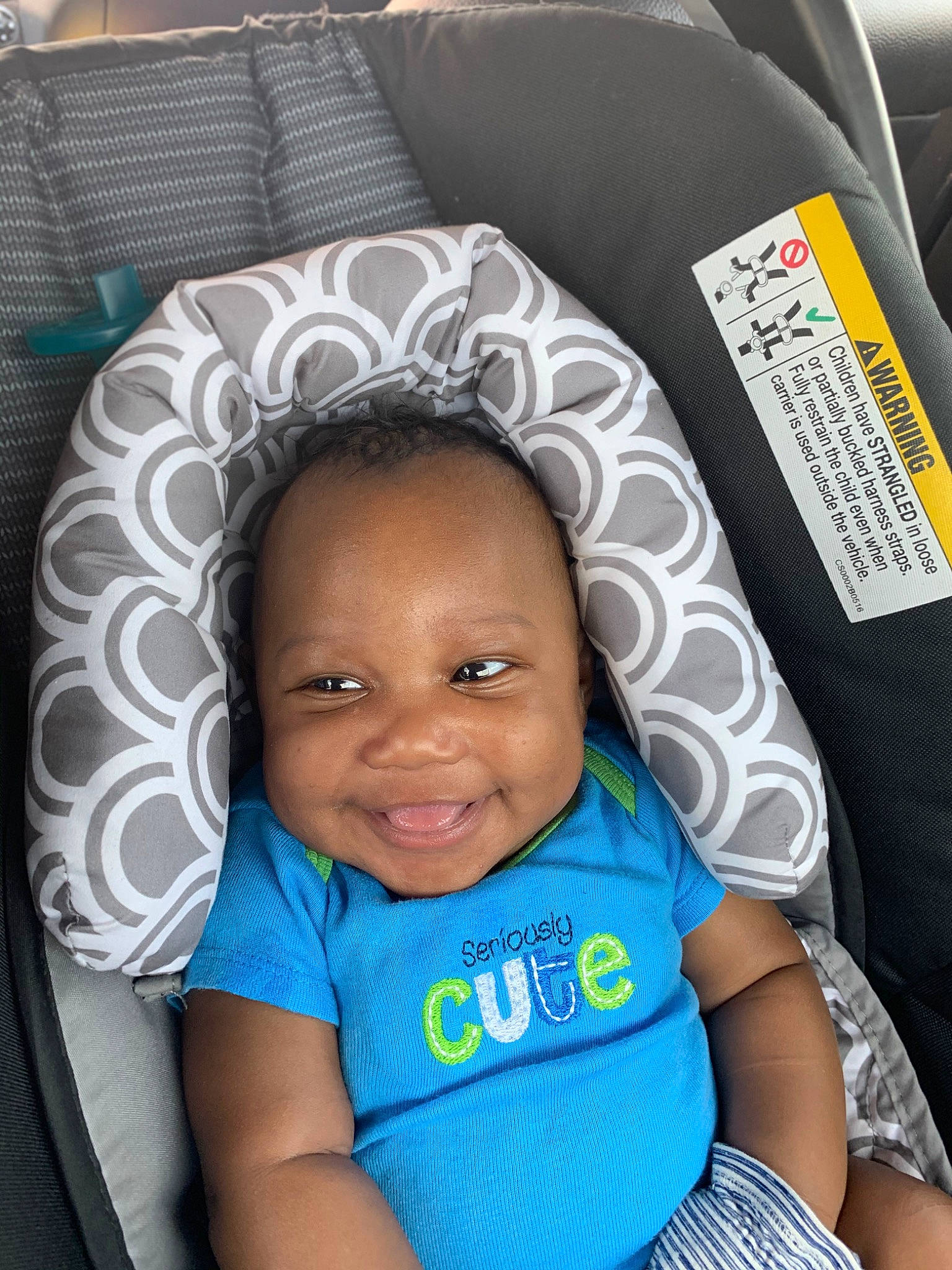 Hezekiah joined the competition — help win amazing prizes! auto_part, automotive_tire, baby_toddler_clothing, black, child, comfort, electric_blue, eye, fun, hairstyle, happy, joy, mammal, person, photograph, product, sitting, skin, smile, textile