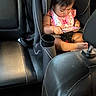 Amelia joined the competition — help win amazing prizes! baby, car, car_interior, carseat, electronics, face, head, mobilephone, person, phone, transportation, vehicle