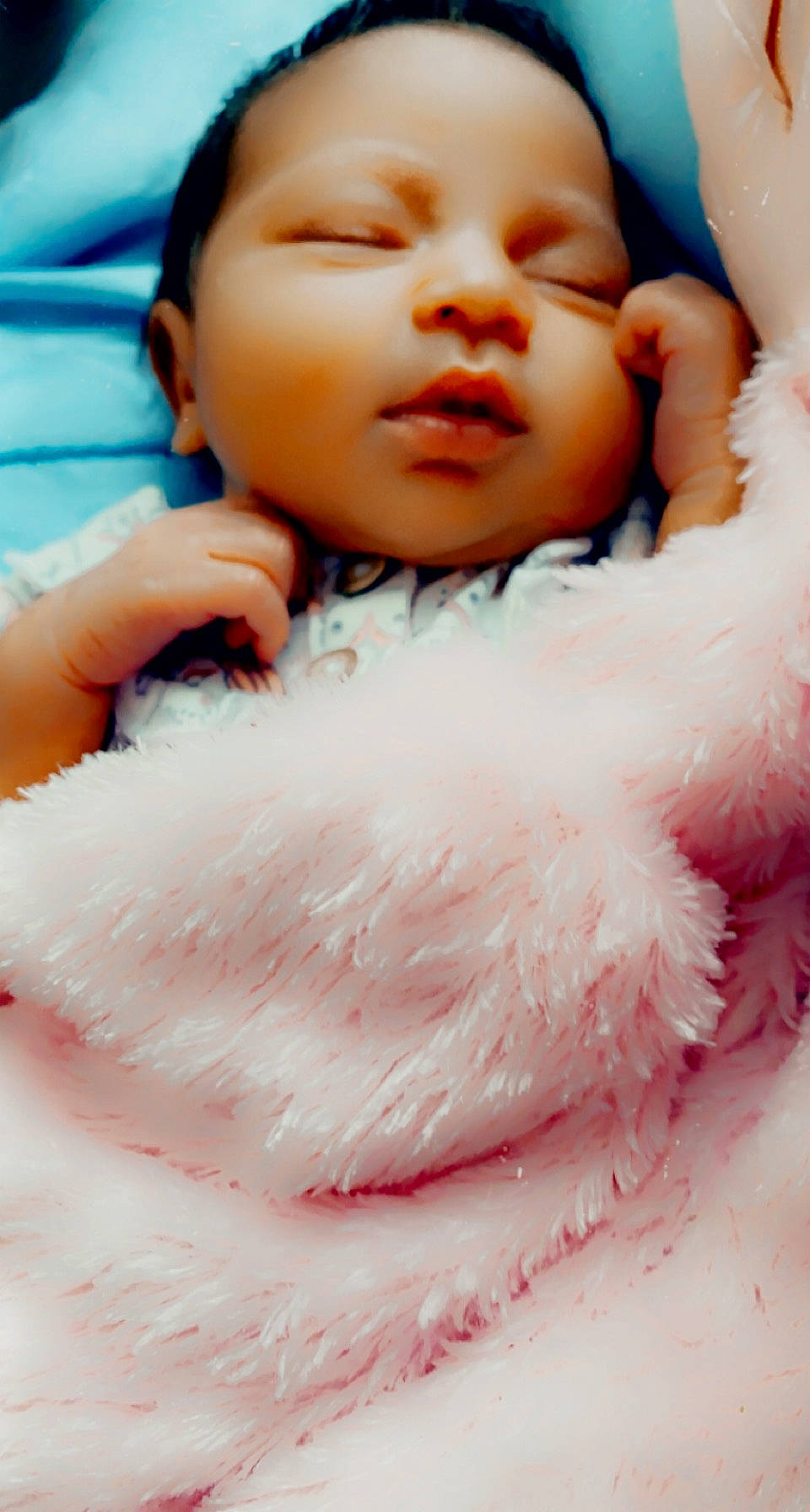 Nalani is registered to the contest to win money with this photo: baby, baby_toddler_clothing, blue, cheek, comfort, eyebrow, finger, flash_photography, gesture, green, happy, iris, mammal, orange, person, photograph, pink, skin, textile, toddler