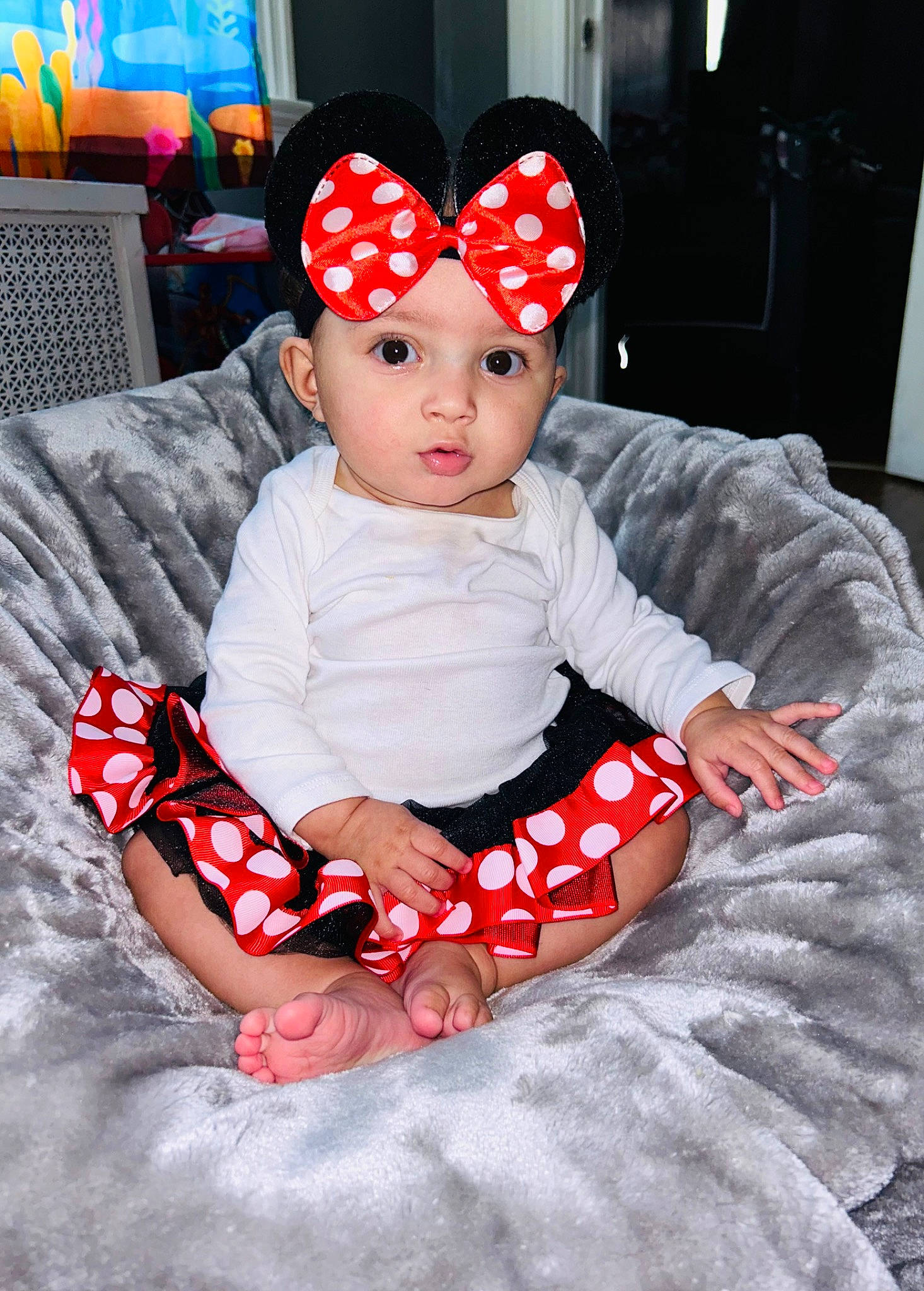 Kamaiya joined the competition — help win amazing prizes! baby, baby_toddler_clothing, beanie, cap, carmine, child, comfort, costume, costume_hat, event, fashion_accessory, fictional_character, flash_photography, flooring, fun, headwear, pattern, person, red, sitting