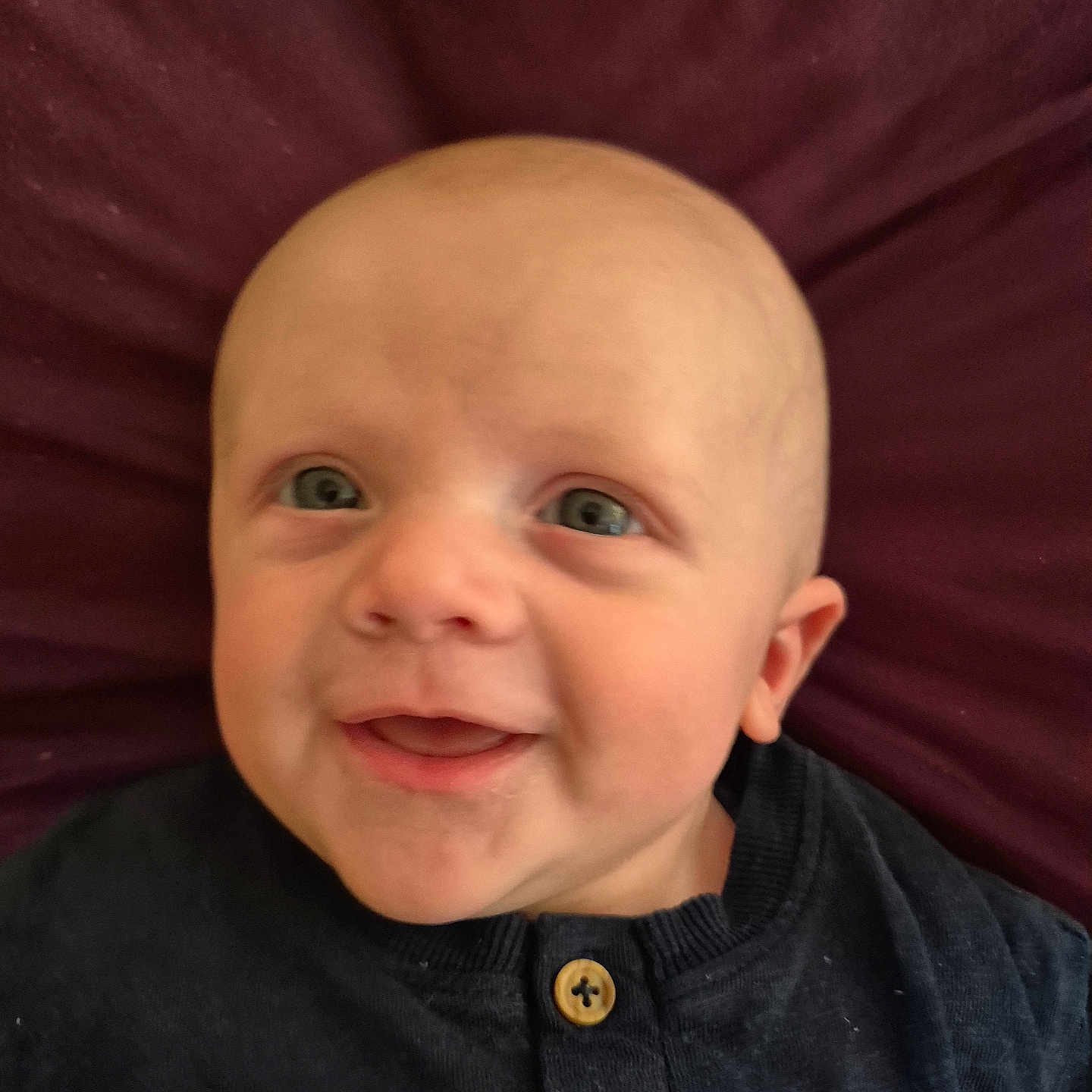 Noah joined the competition — help win amazing prizes! baby, babylaughing, bodypart, clothing, coat, face, finger, hand, happy, head, jacket, laughing, mouth, newborn, pants, person, photography, portrait, smile, teeth