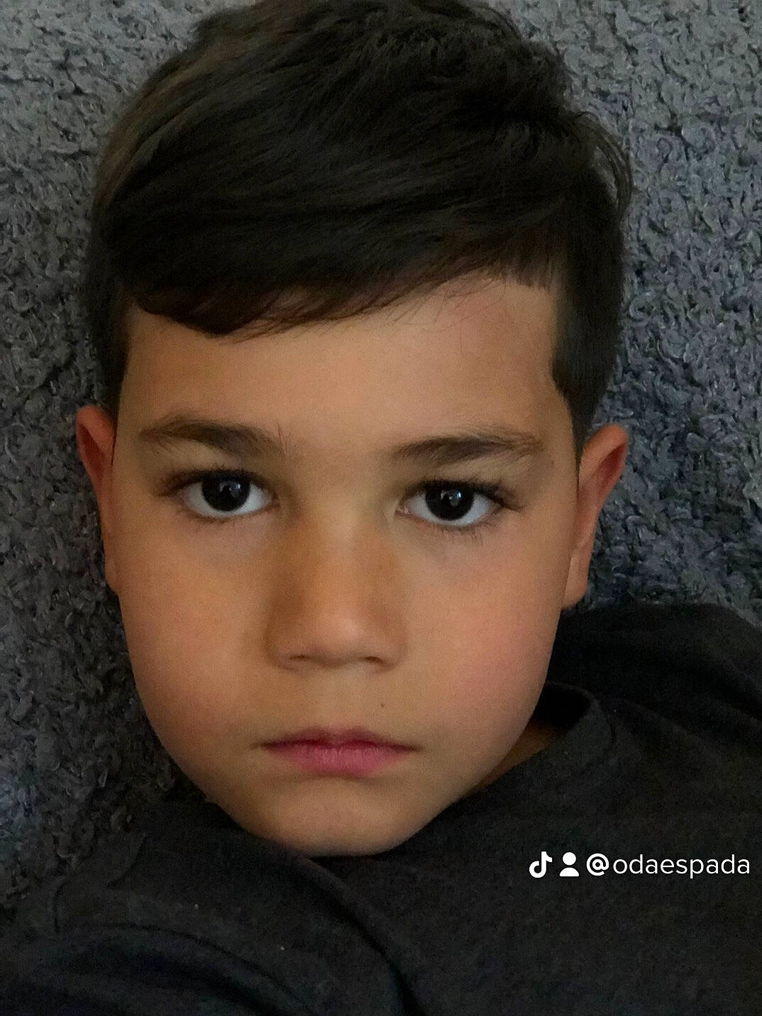 Xavier participe au concours pour gagner de l'argent avec cette photo : black_hair, caesar_cut, cheek, child, crop, electric_blue, eyebrow, eyelash, flash_photography, forehead, happy, iris, jaw, lip, no_expression, nose, person, portrait, portrait_photography, t_shirt